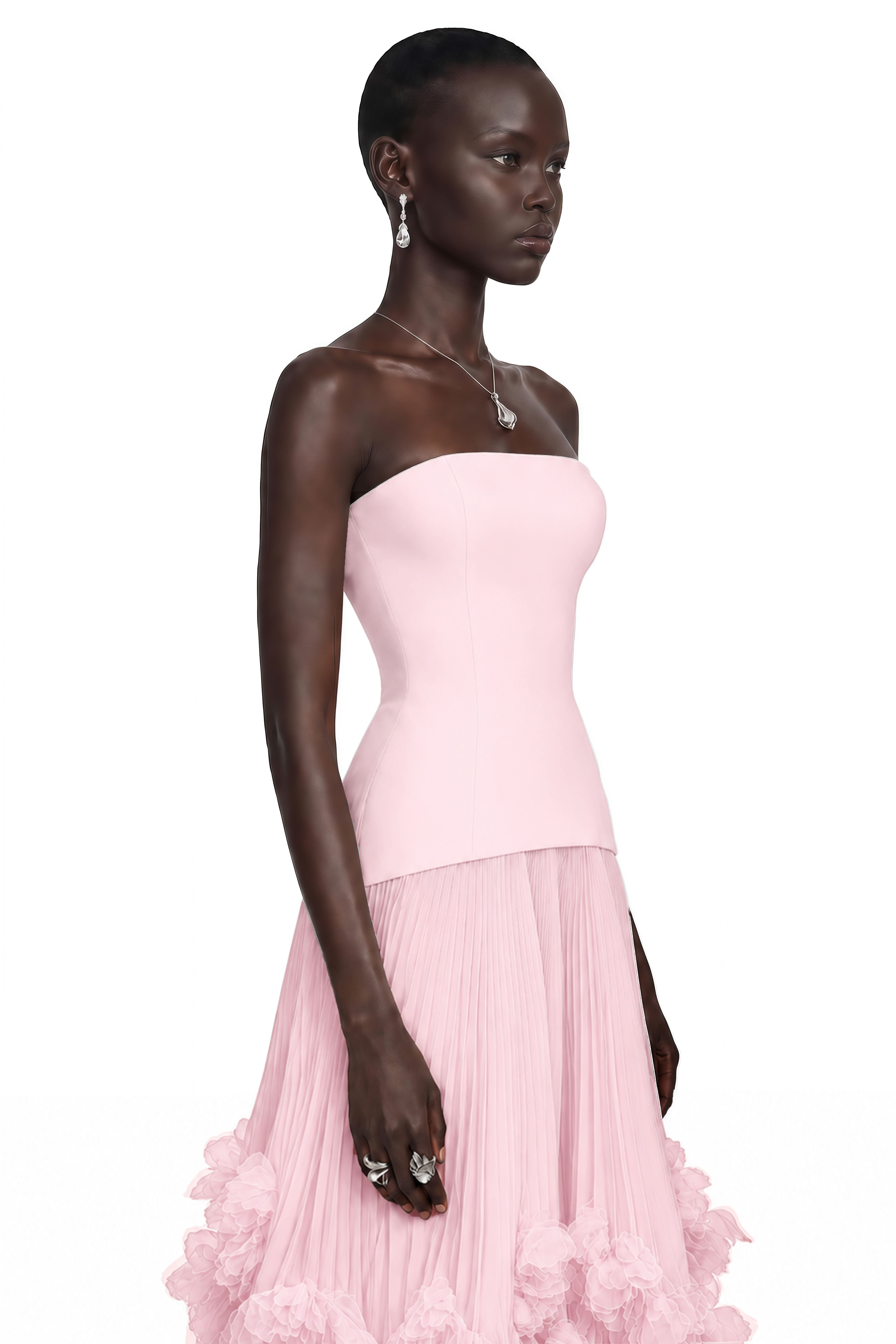 Pink strapless gown with fitted bodice and ruffled tulle skirt