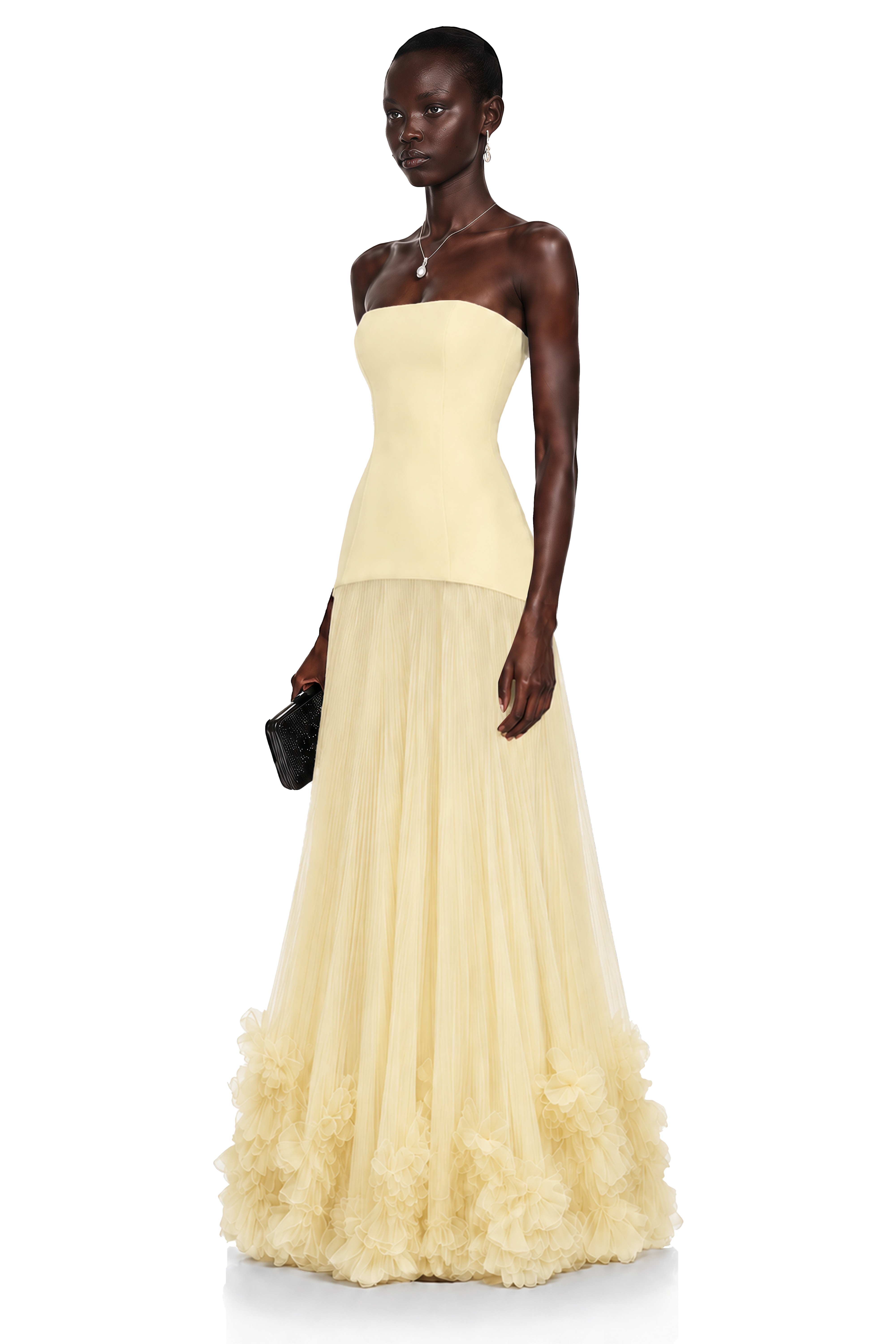 Pale yellow strapless gown with fitted bodice and ruffled tulle skirt