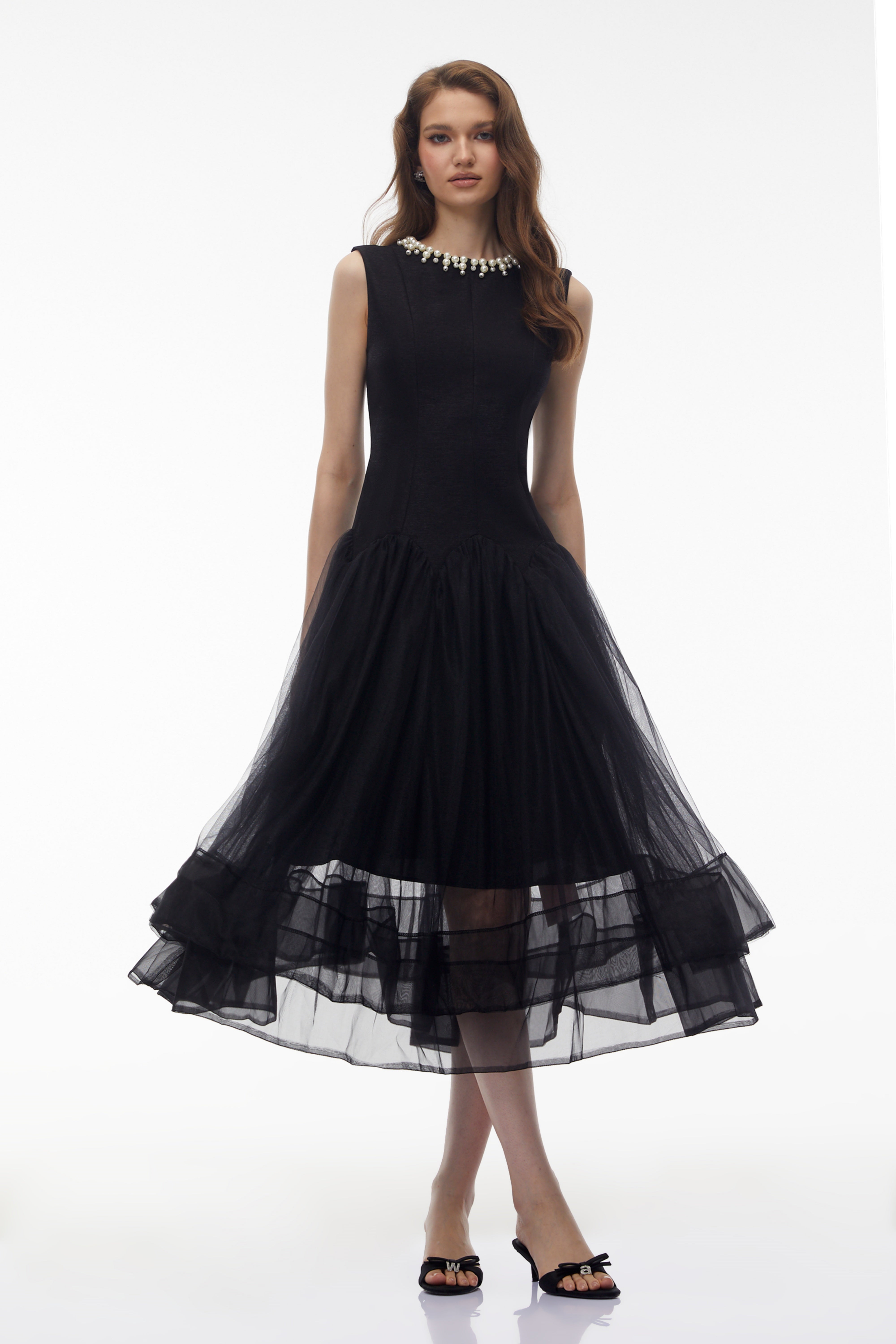Black sleeveless midi dress with pearl neckline and tulle skirt