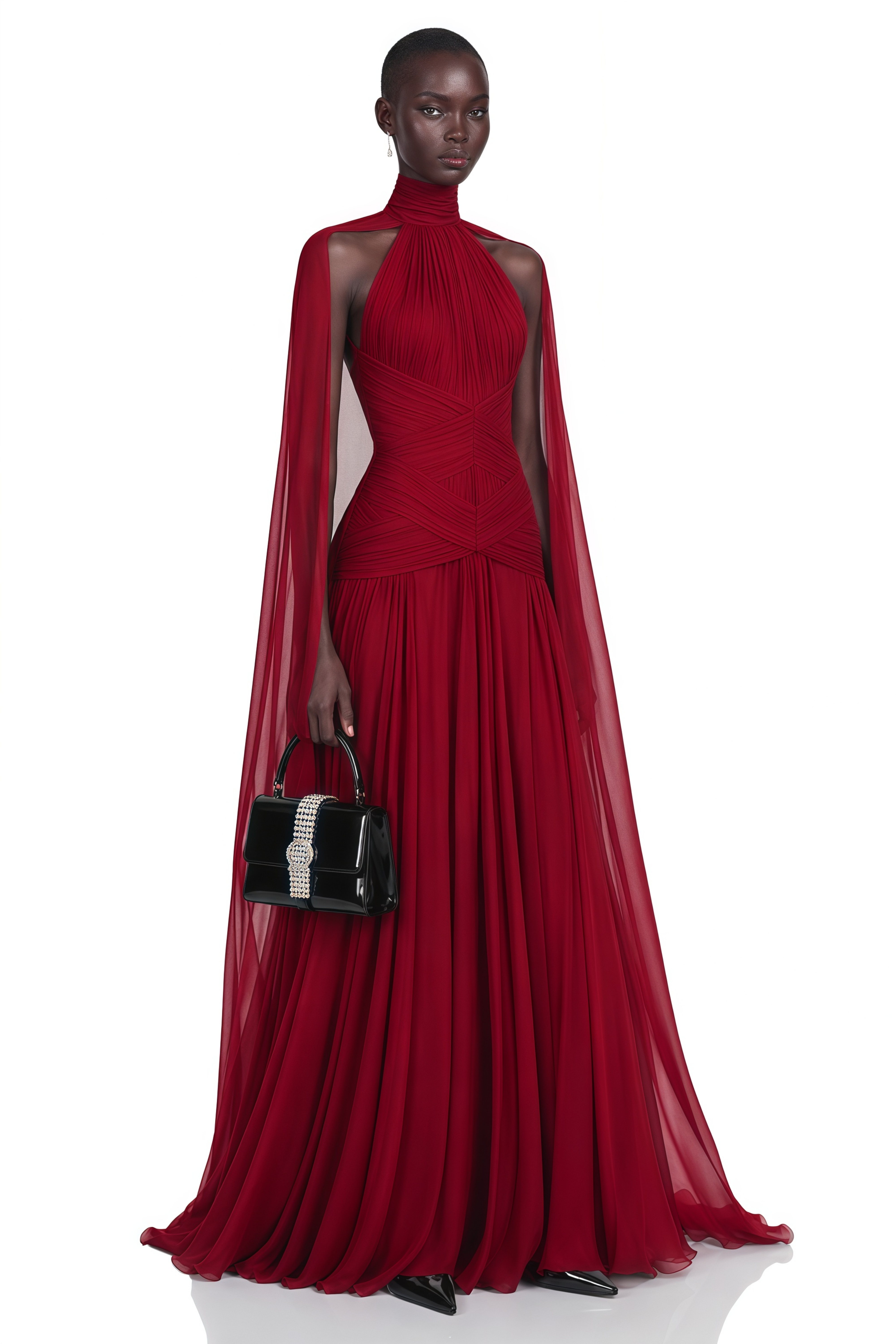 Deep red high-neck halter gown with floor-length cape sleeves
