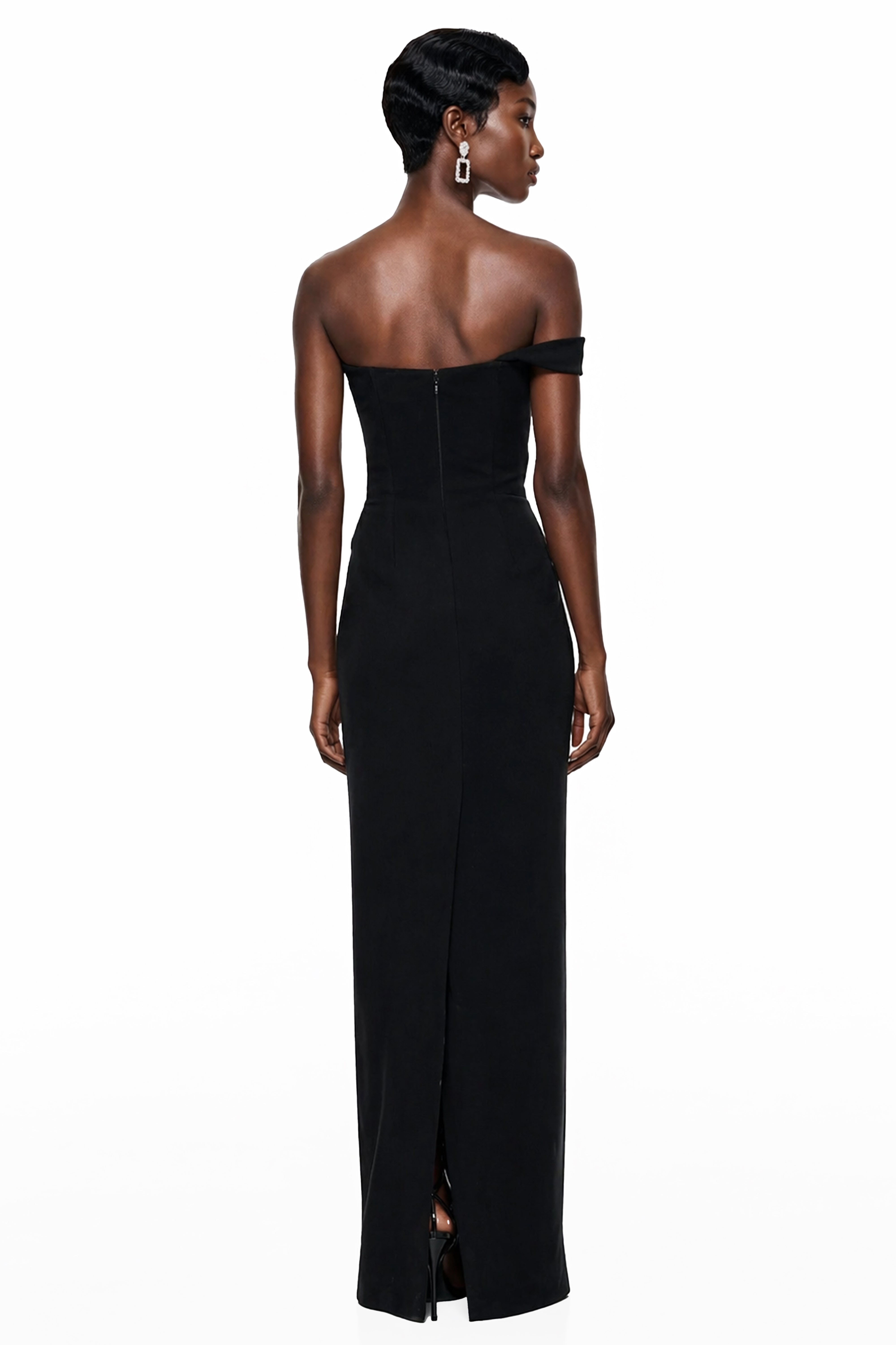 Black column maxi dress featuring a cream scalloped asymmetrical bodice and a single off-the-shoulder strap