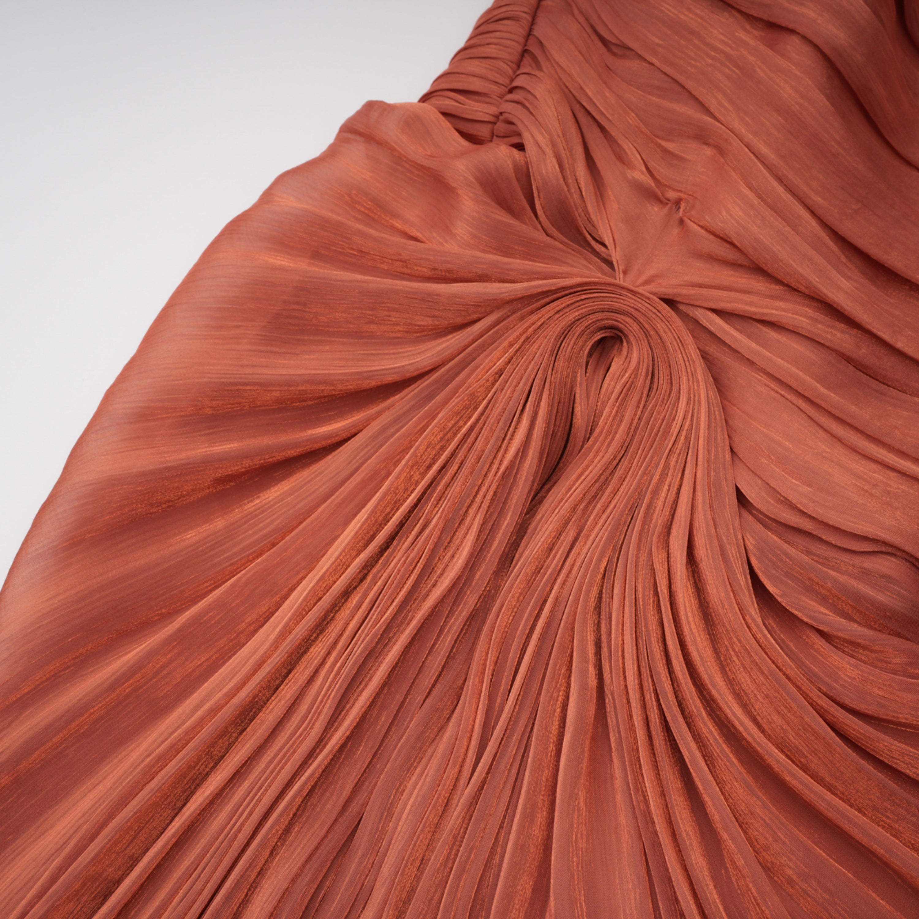 Dusty rose strapless gown with draped skirt and high slit