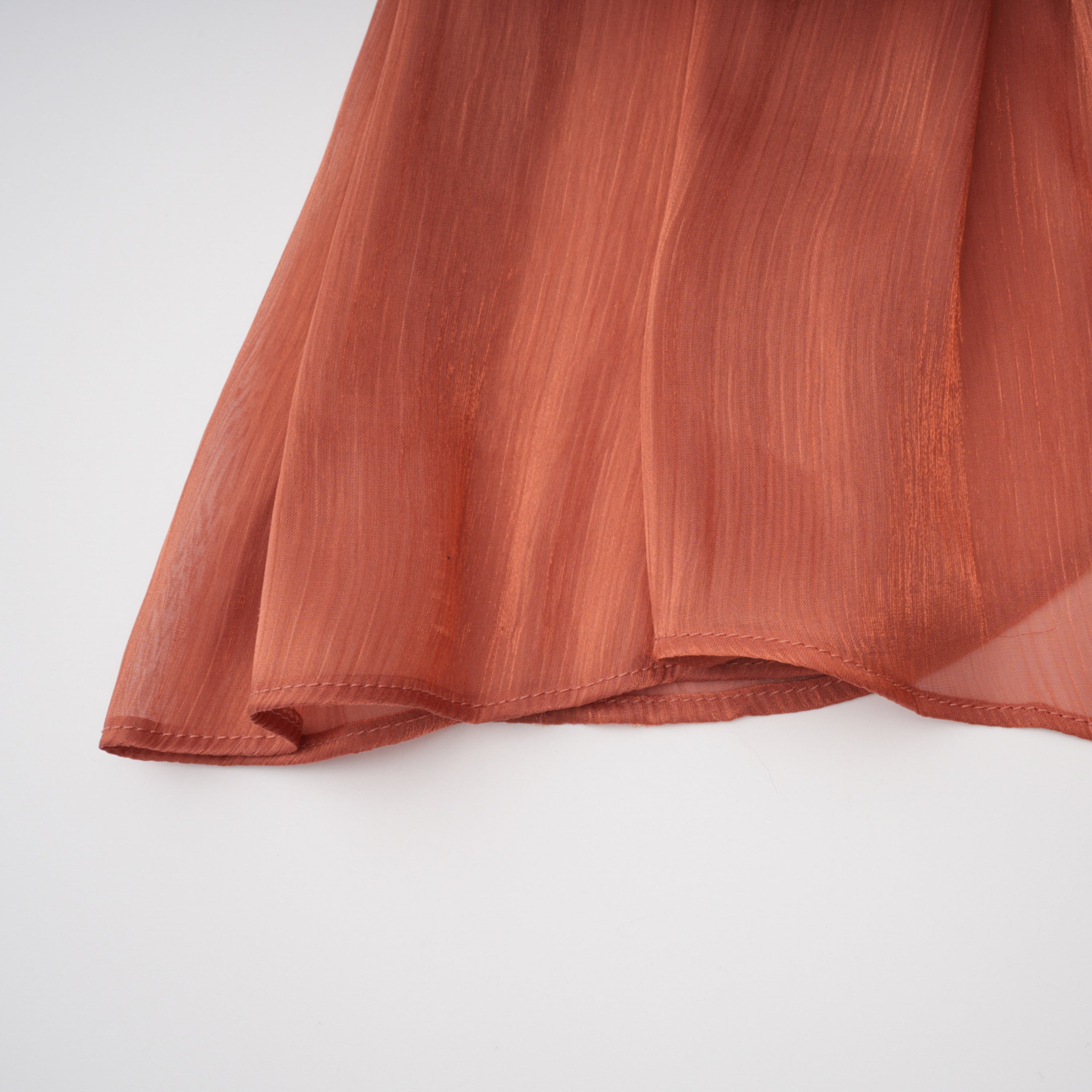 Dusty rose strapless gown with draped skirt and high slit