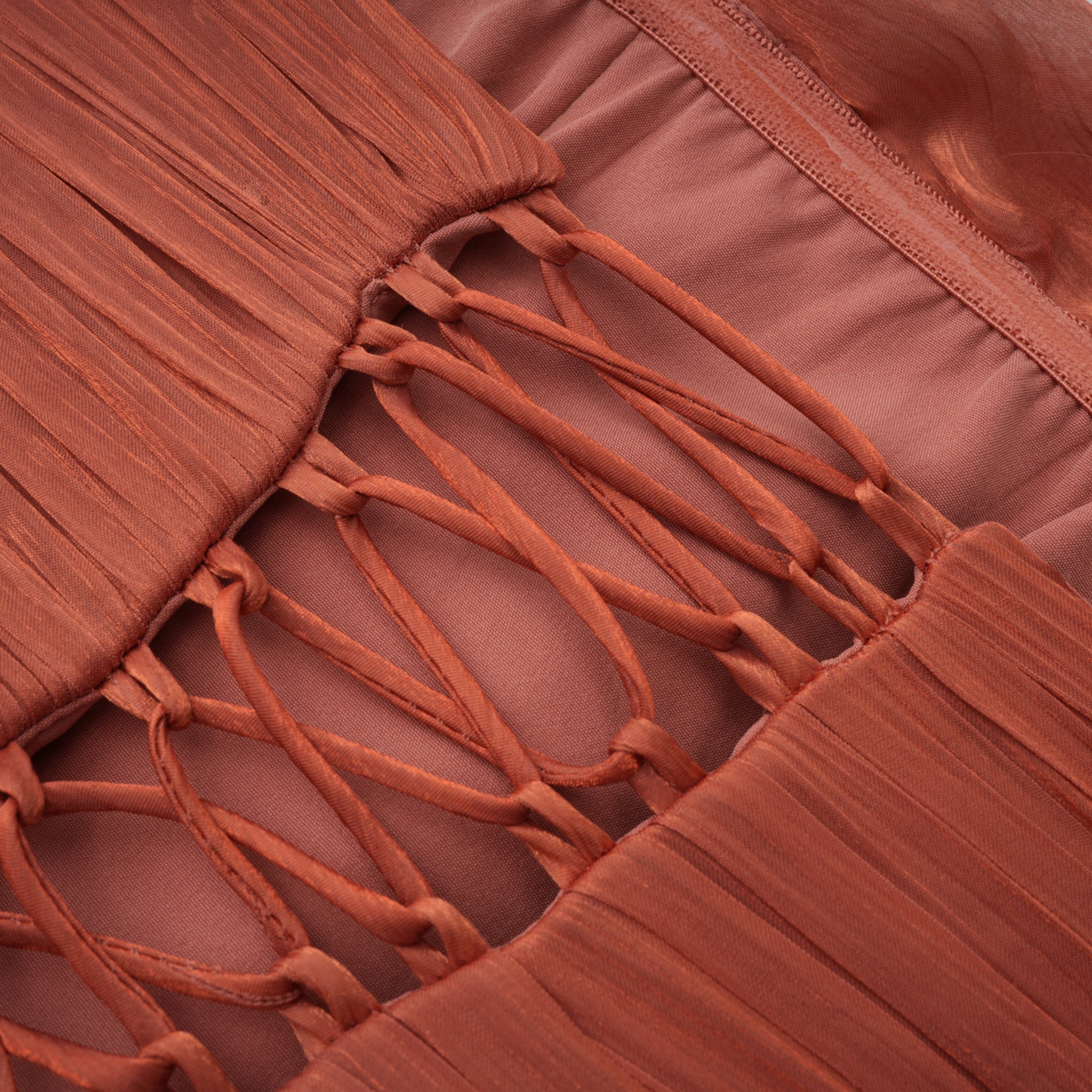 Dusty rose strapless gown with draped skirt and high slit