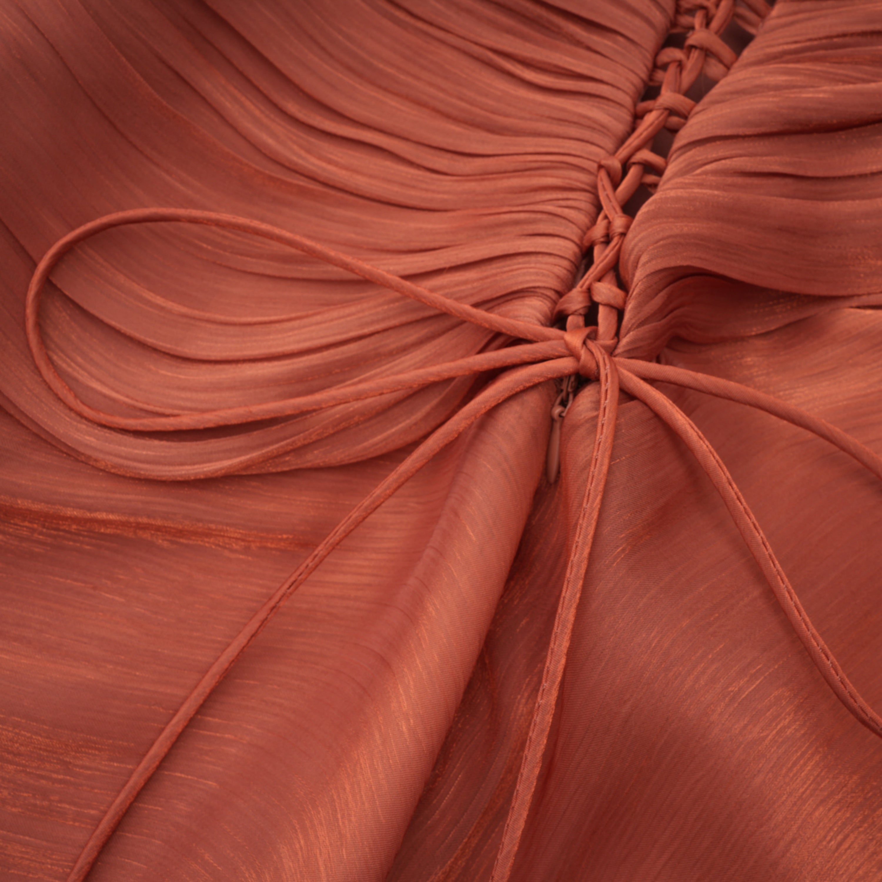 Dusty rose strapless gown with draped skirt and high slit