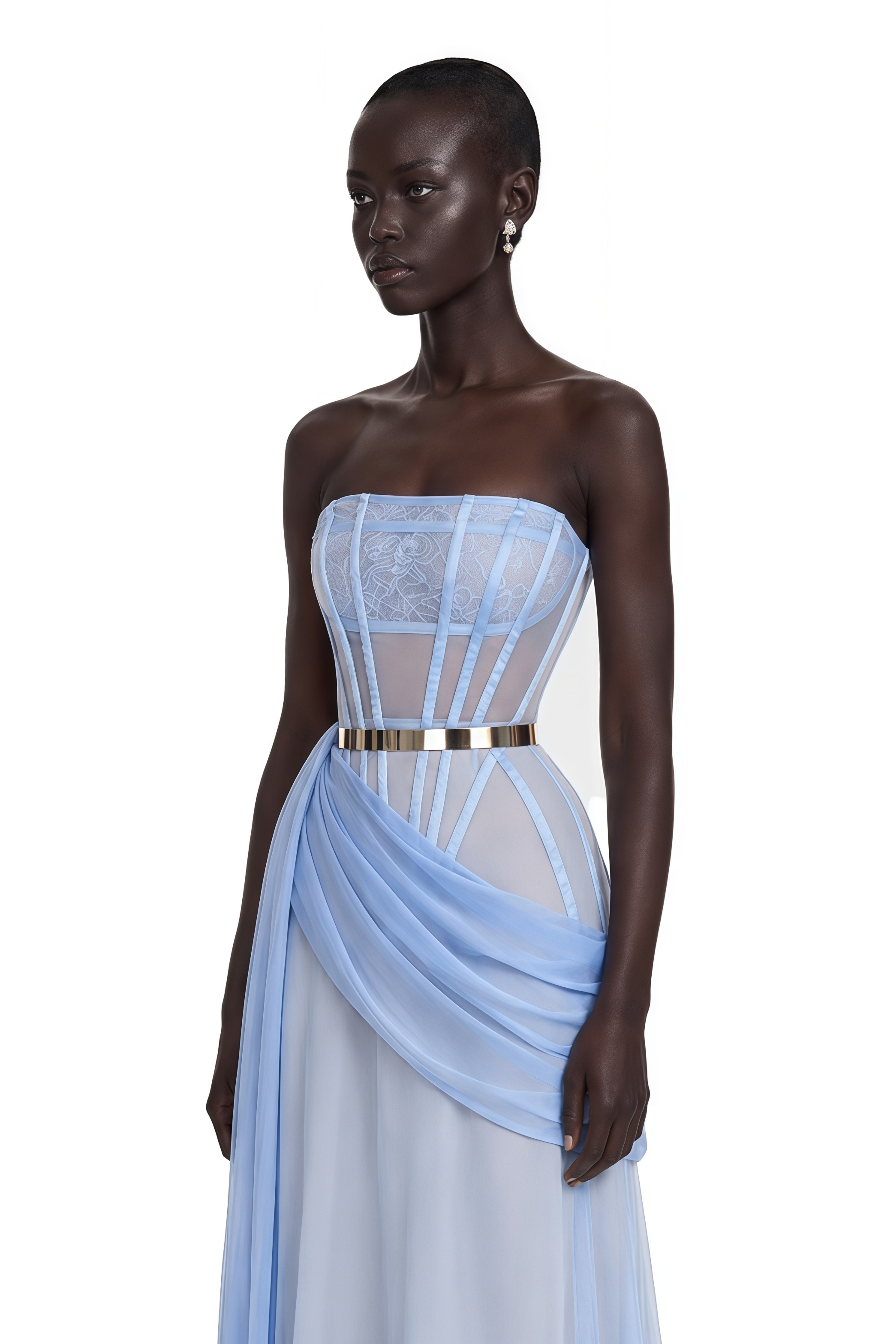 Light blue strapless corset gown with a draped sash and a gold belt