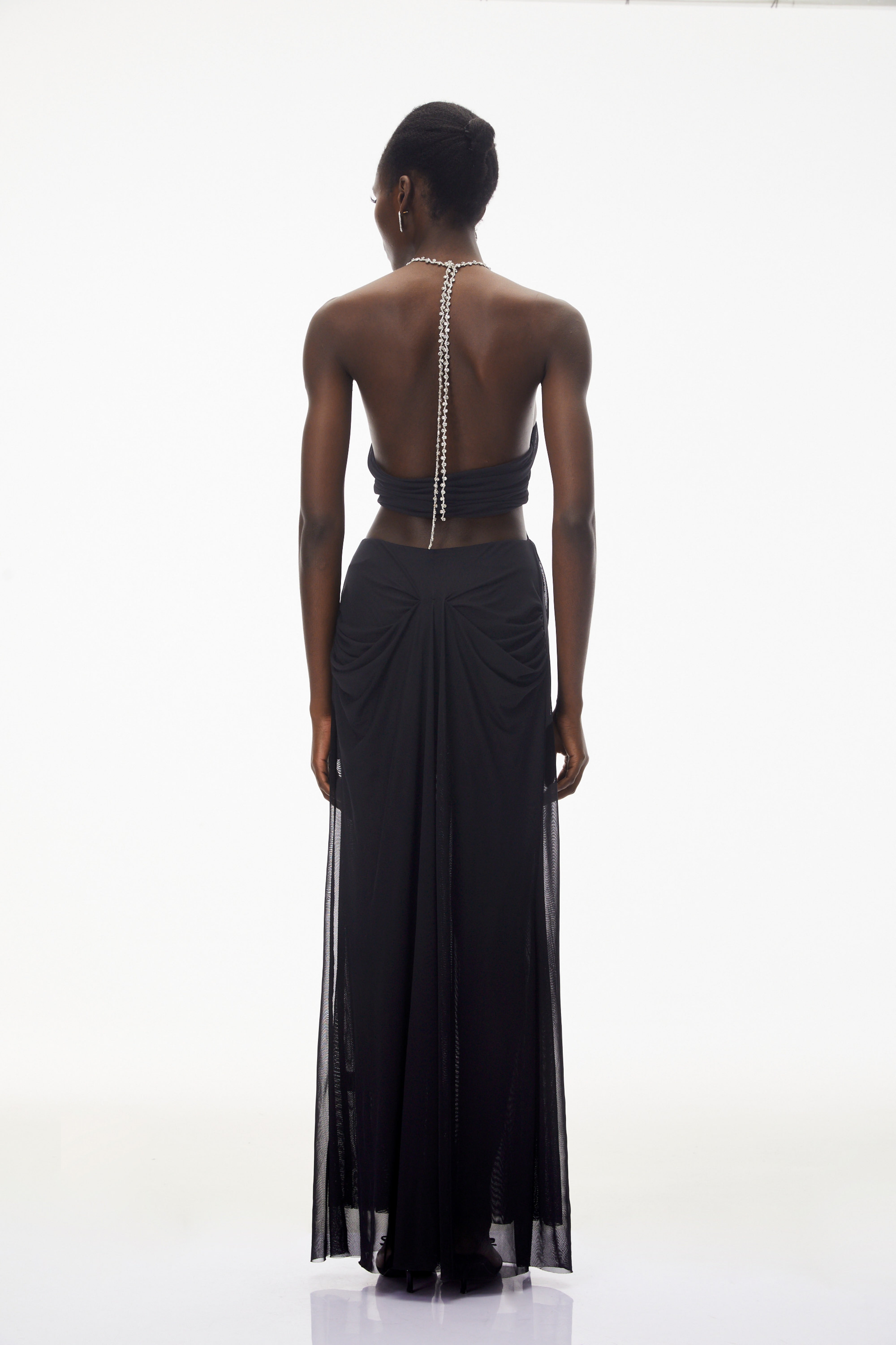 Black halter maxi dress with crystal-embellished cutouts