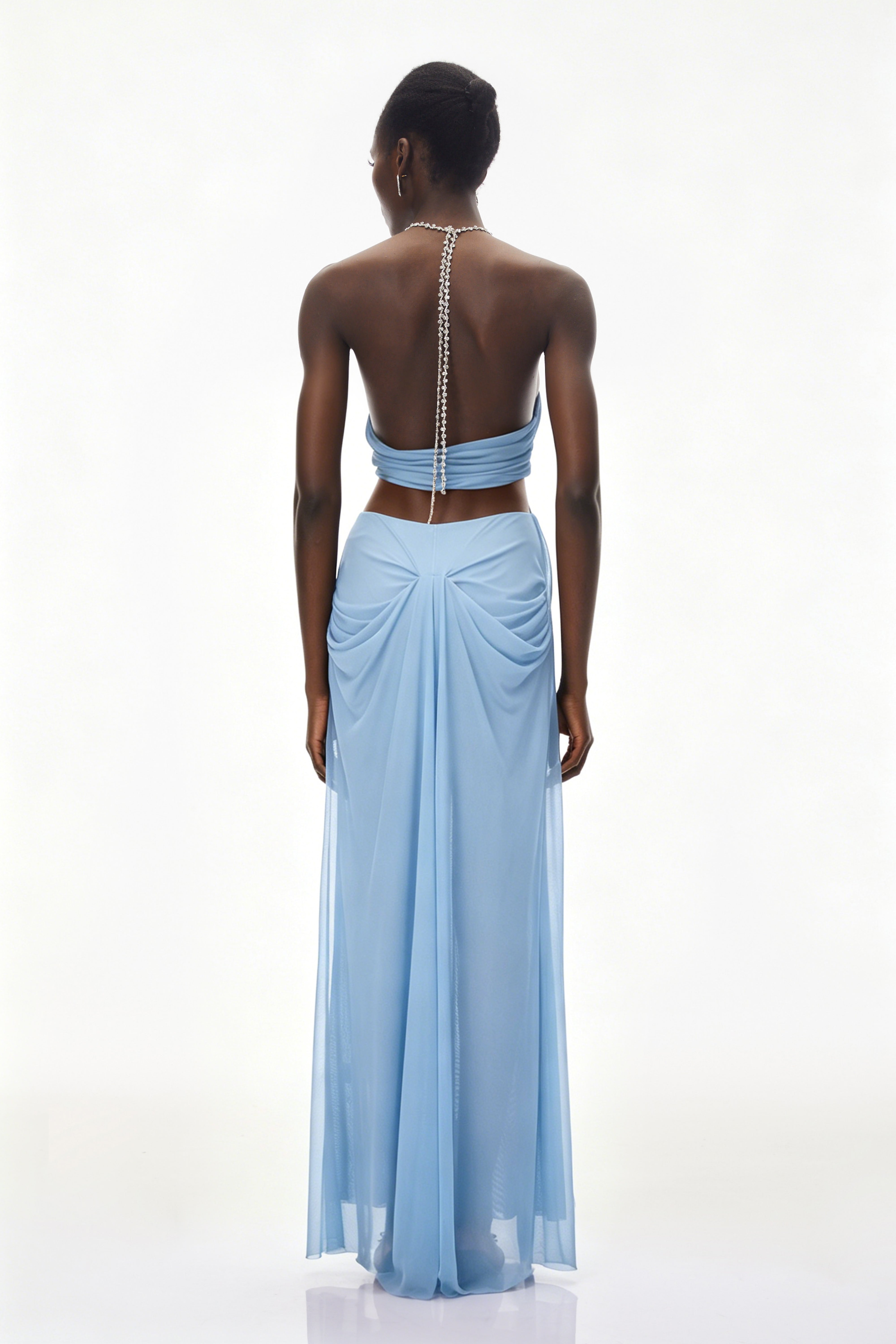 Light blue sheer halter gown with crystal-link cutouts
