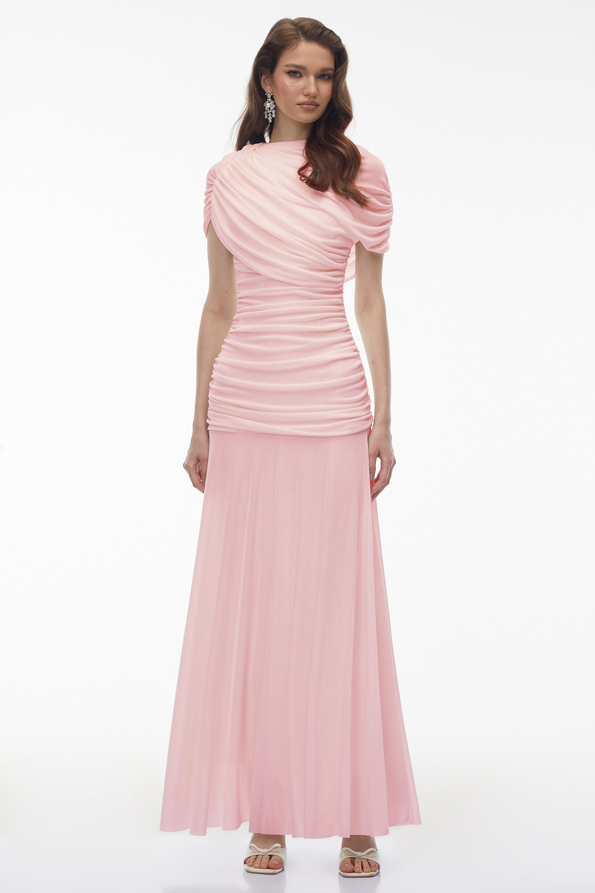 Light pink maxi dress with an asymmetric draped cowl neckline, a ruched bodice, and a flowing skirt