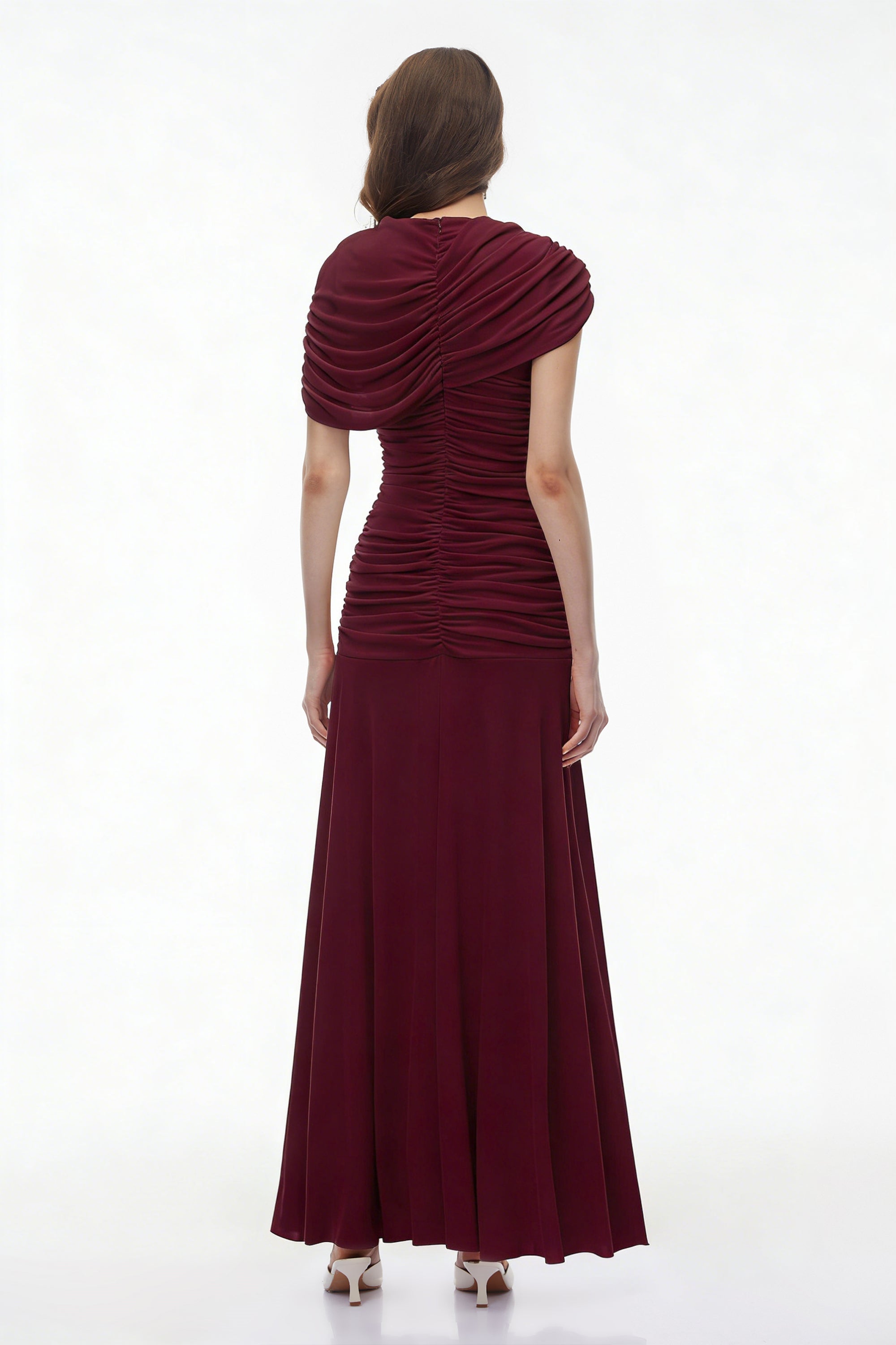 Burgundy maxi dress with an asymmetric draped cowl neckline, a ruched bodice, and a flowing skirt
