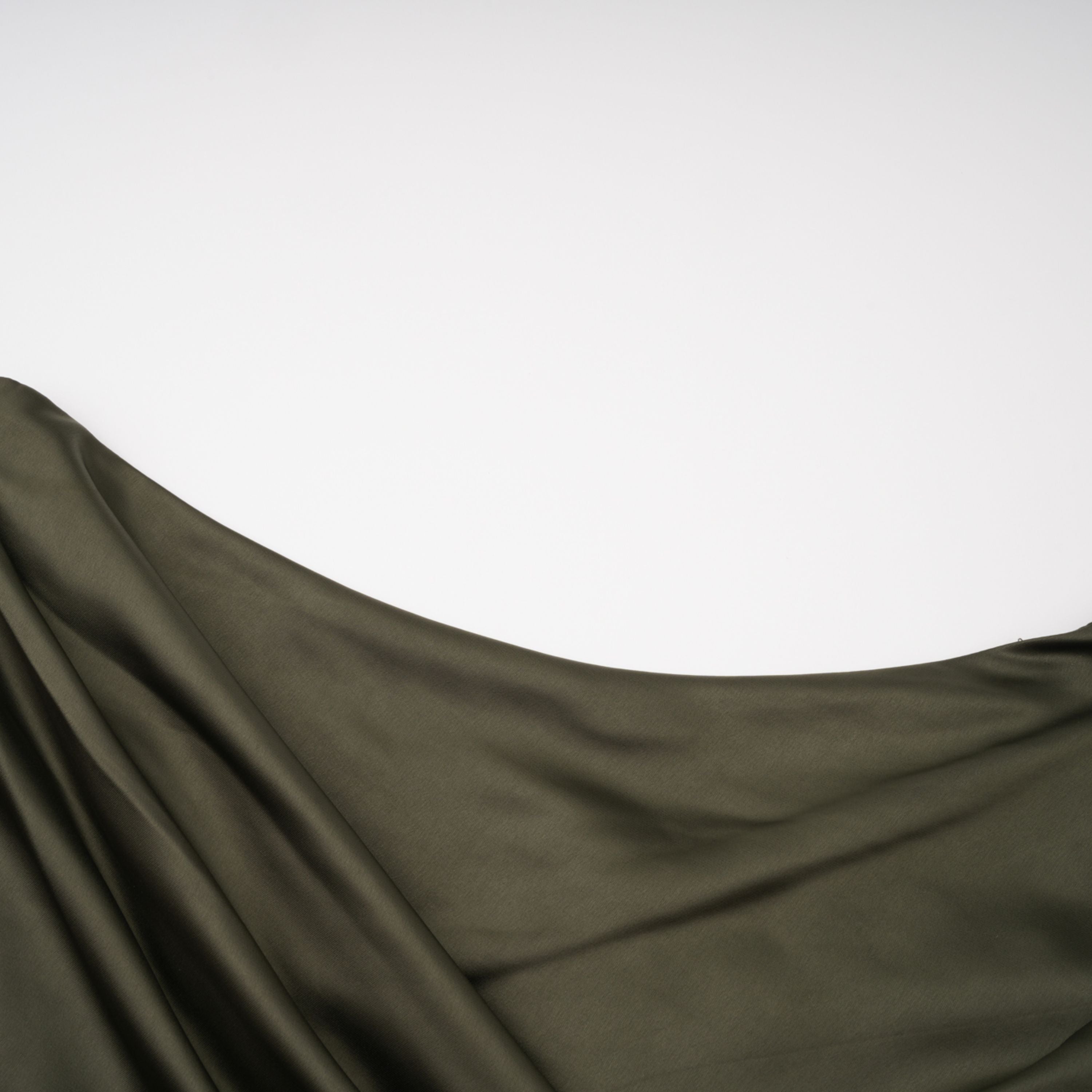 Olive green satin maxi dress with a draped one-shoulder neckline and ruched fitted skirt
