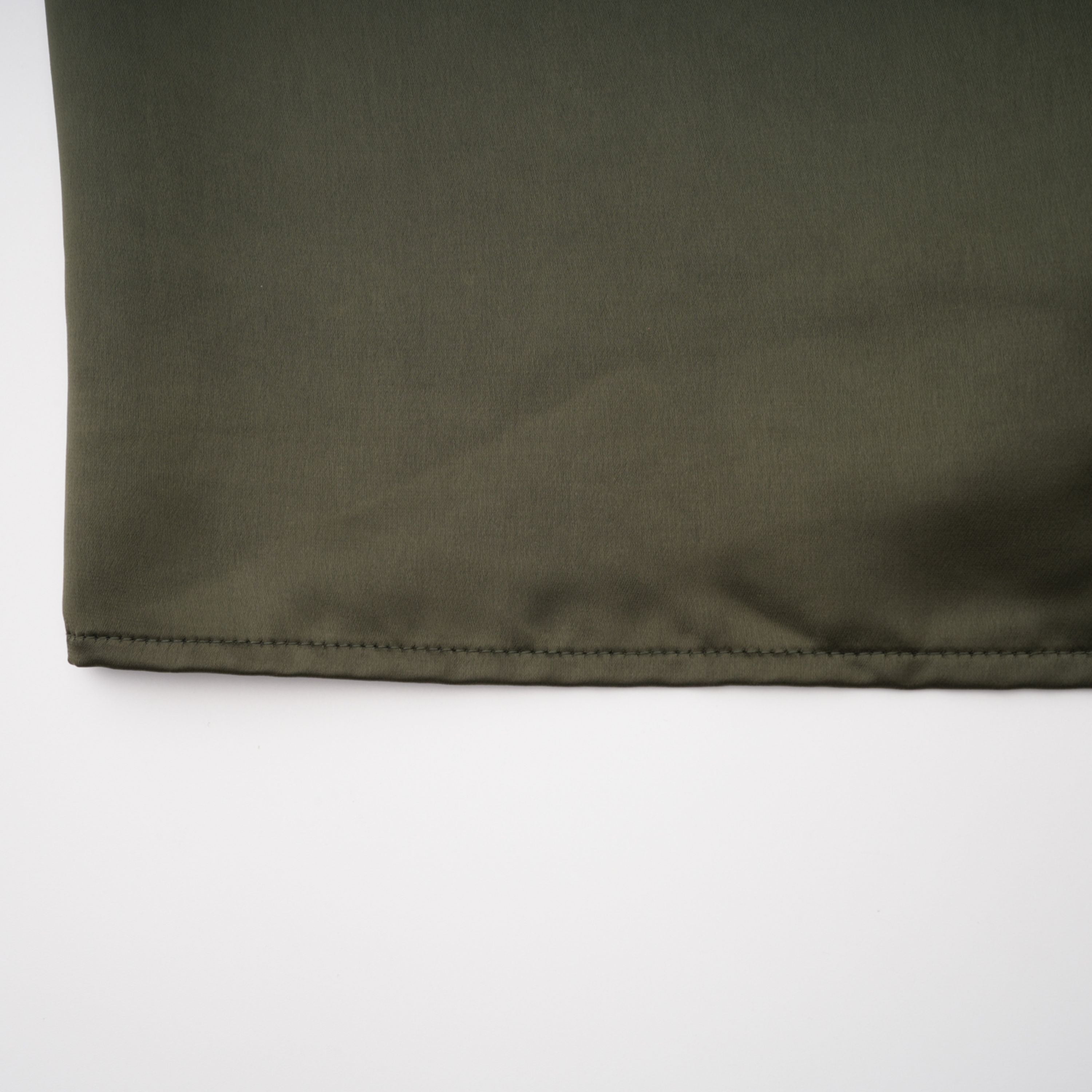 Olive green satin maxi dress with a draped one-shoulder neckline and ruched fitted skirt
