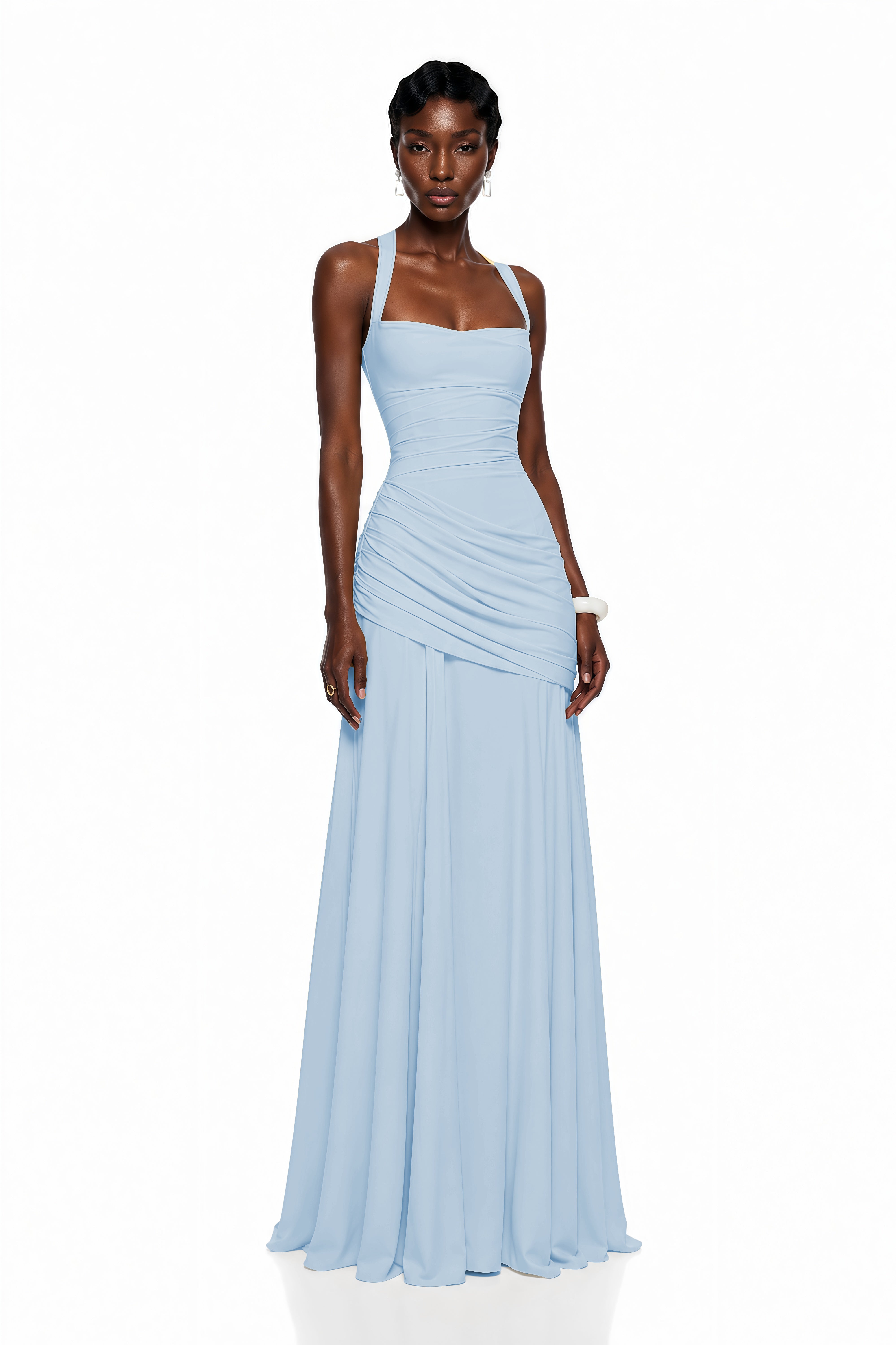 Light blue maxi dress with thick straps, a gathered corset bodice, and a draped asymmetric skirt