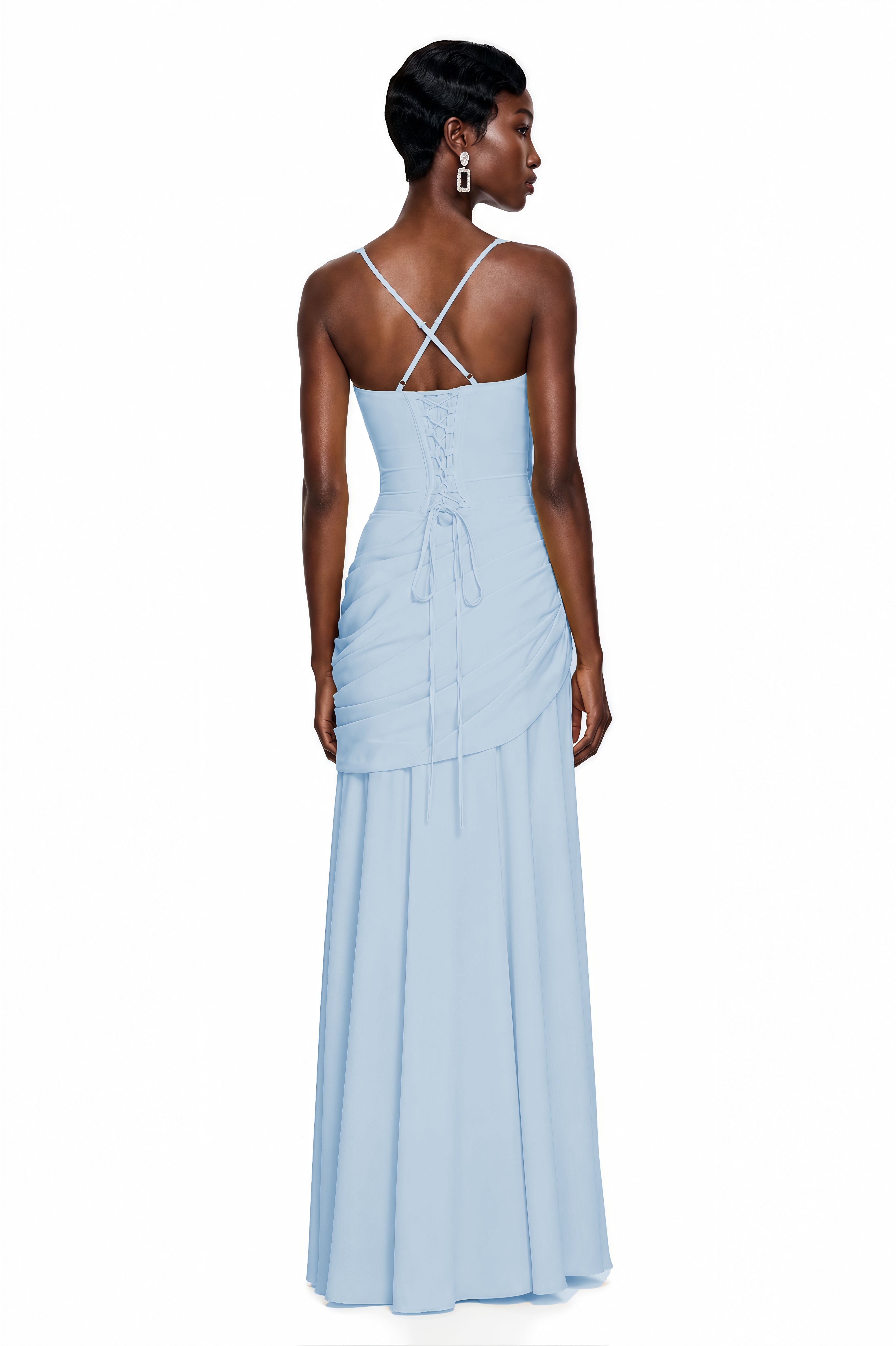 Light blue maxi dress with thick straps, a gathered corset bodice, and a draped asymmetric skirt