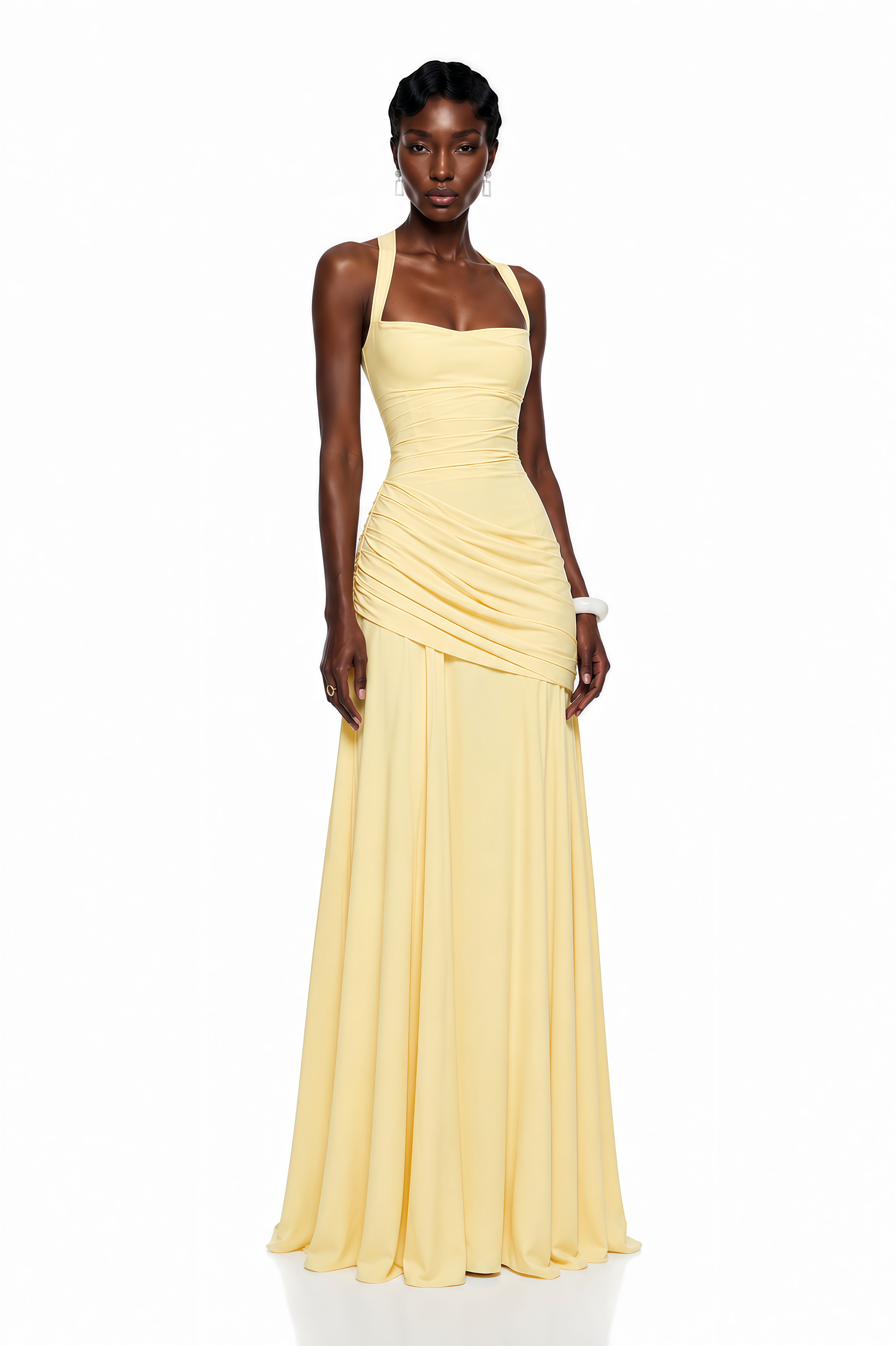 Yellow maxi dress with thick straps, a gathered corset bodice, and a draped asymmetric skirt