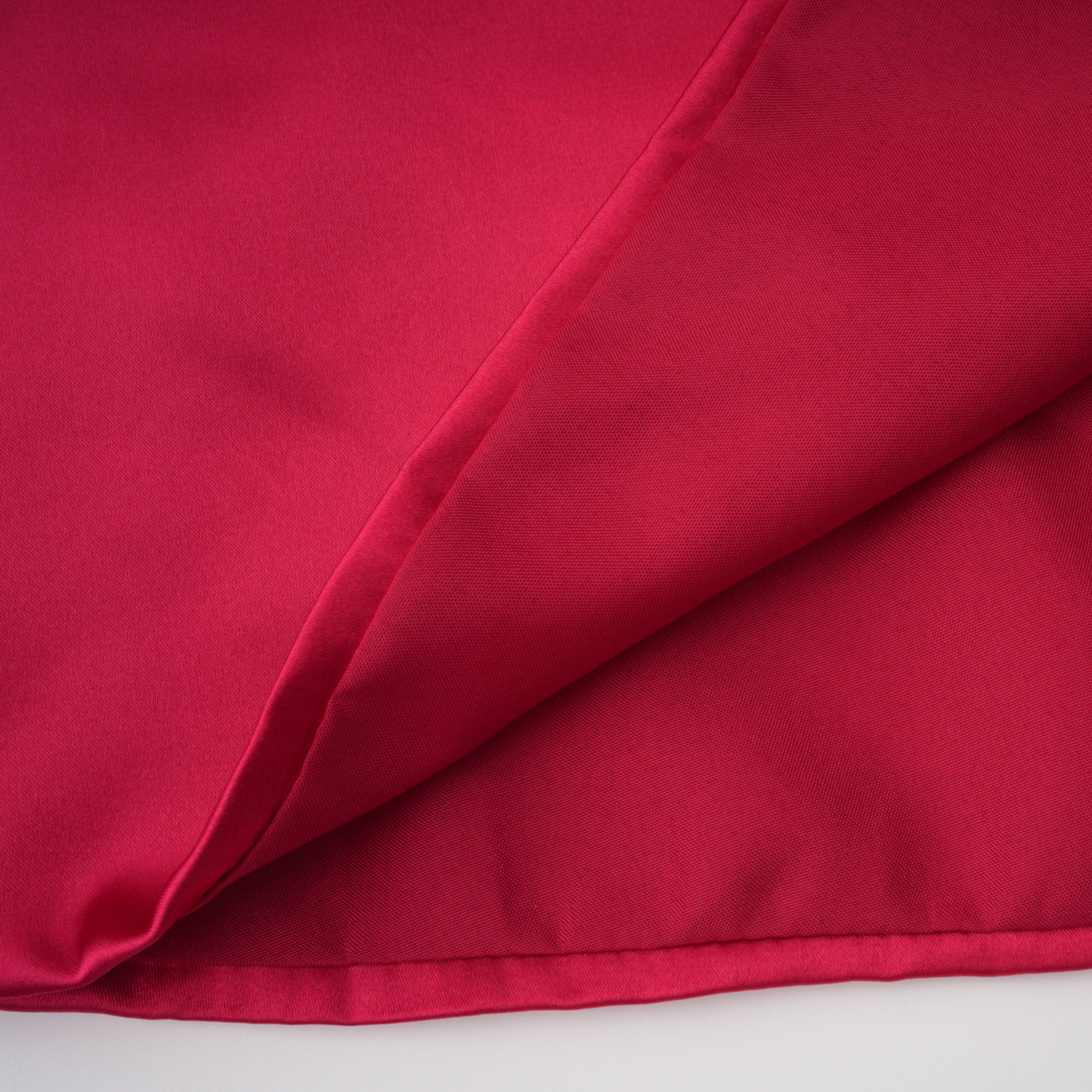 Red one-shoulder satin gown with chest cutout and draped waist