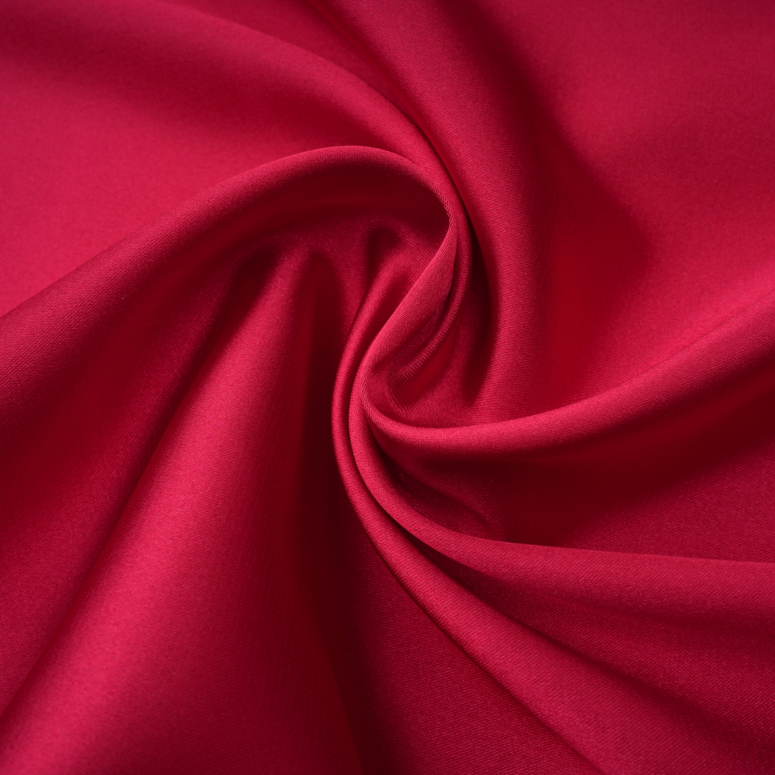 Red one-shoulder satin gown with chest cutout and draped waist