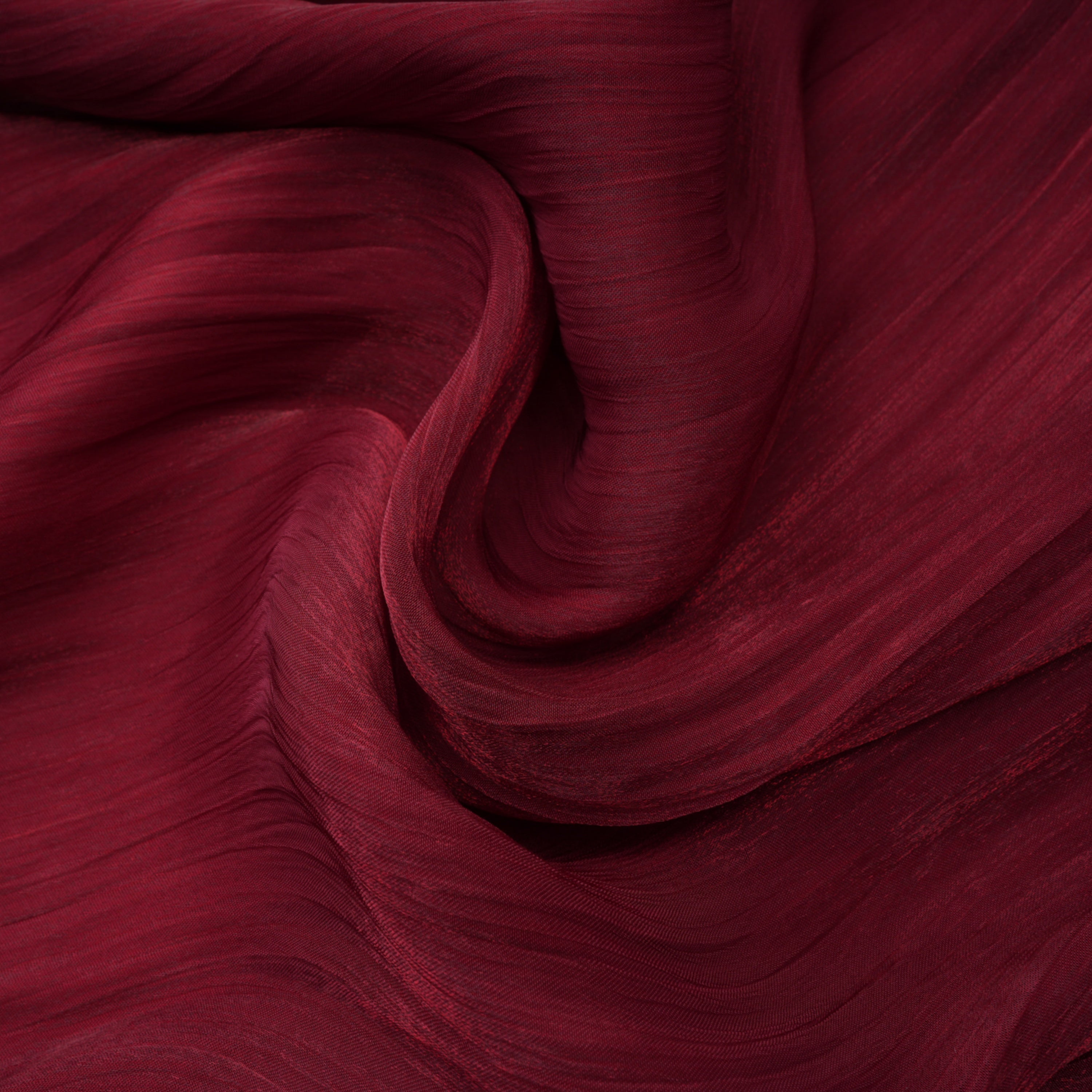 Burgundy pleated strapless gown with matching cape and high slit