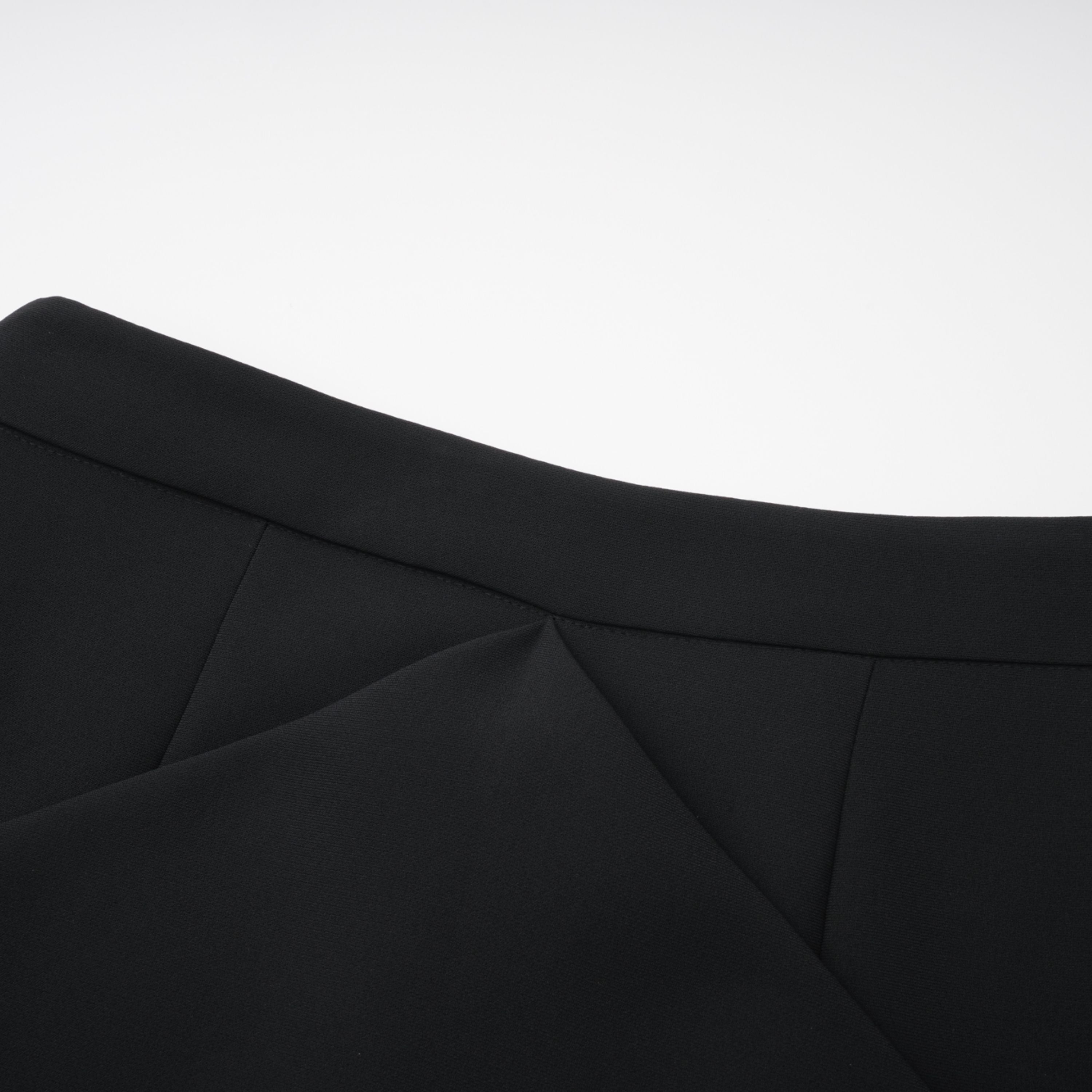 Black structured two-piece midi set with a boxy crop top and an exaggerated hip midi skirt