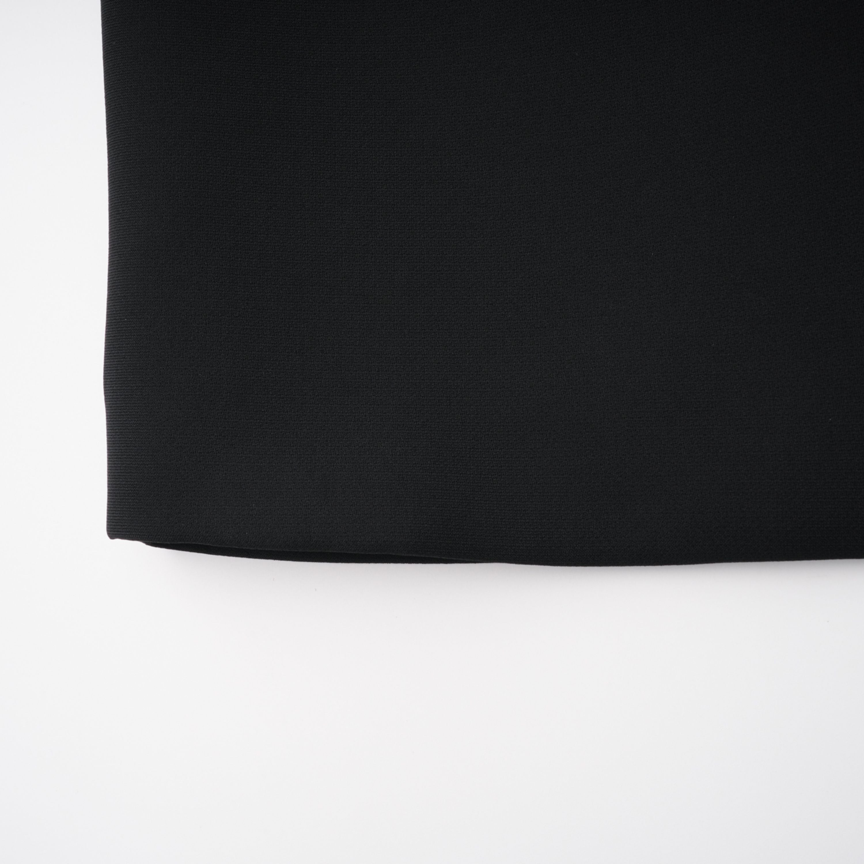 Black structured two-piece midi set with a boxy crop top and an exaggerated hip midi skirt