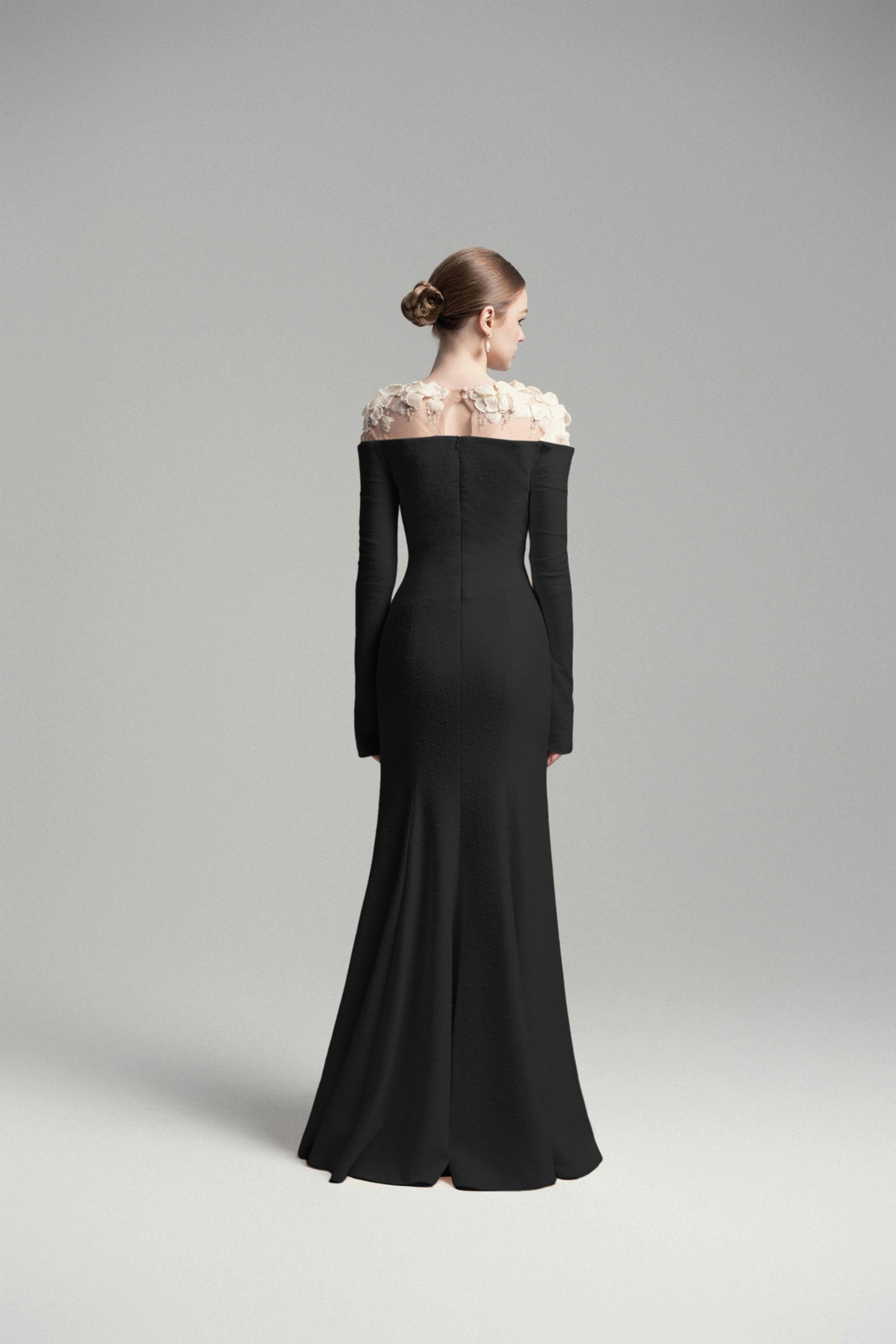 Black mermaid gown with floral appliqué illusion neckline