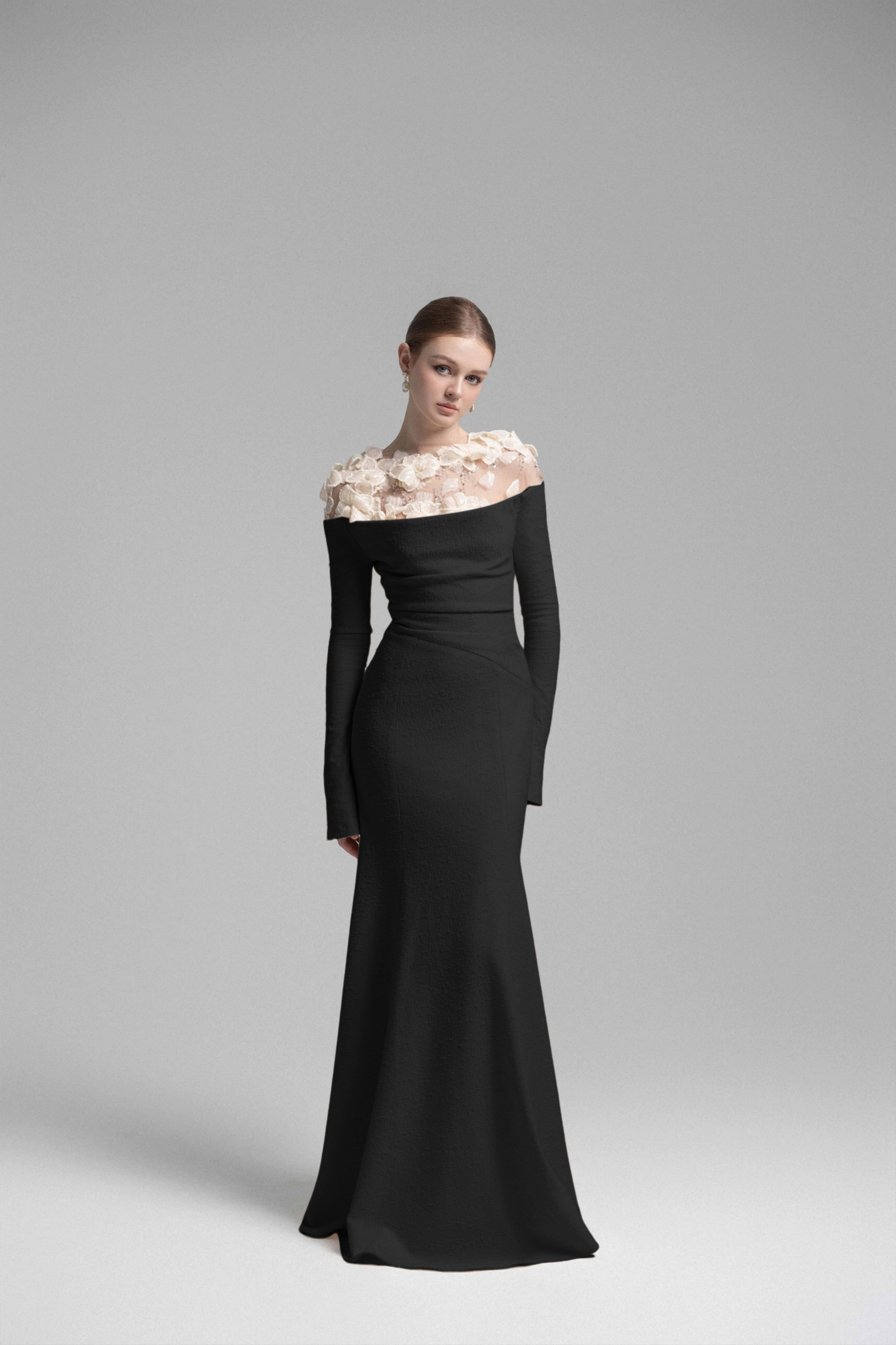 Black mermaid gown with floral appliqué illusion neckline