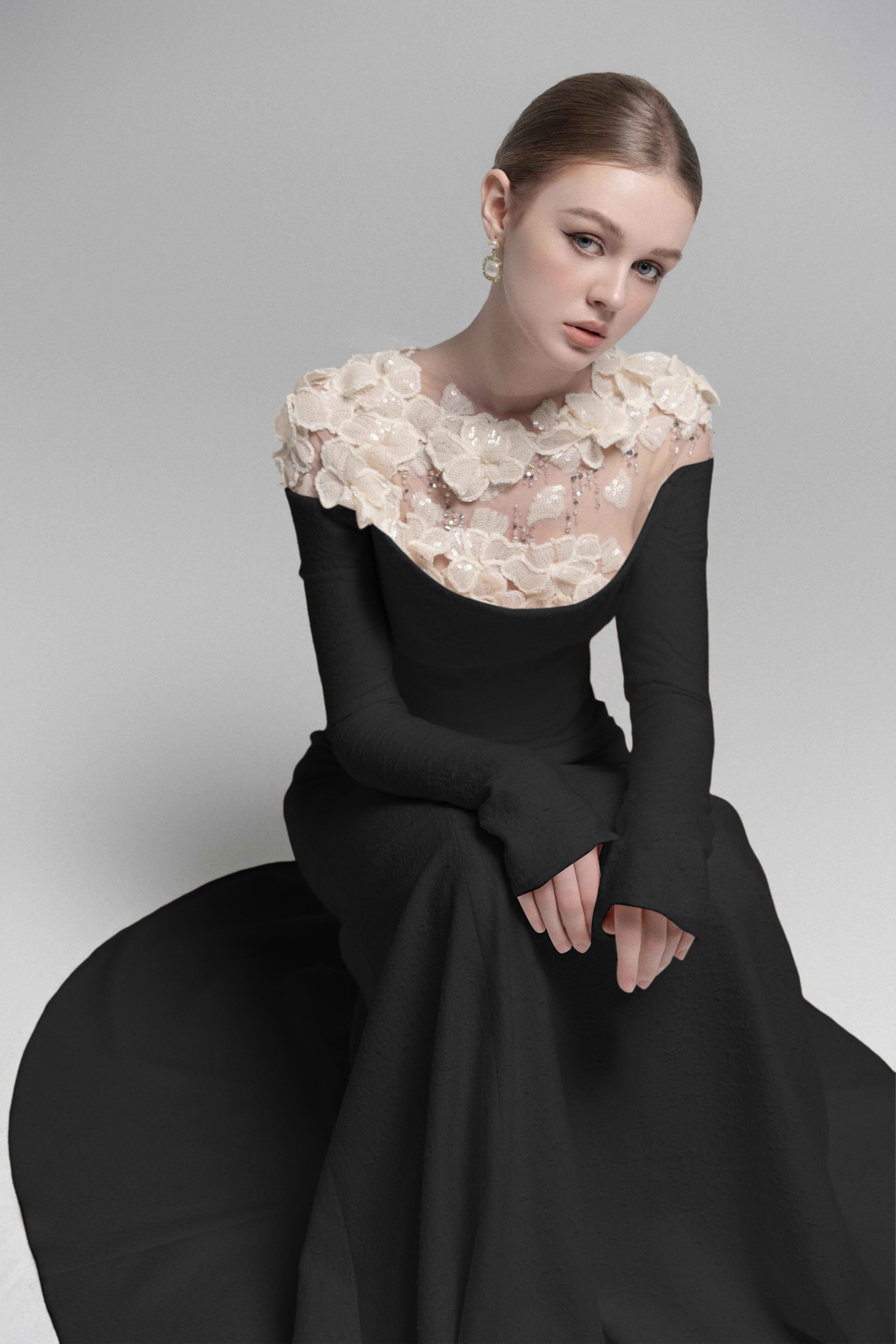 Black mermaid gown with floral appliqué illusion neckline