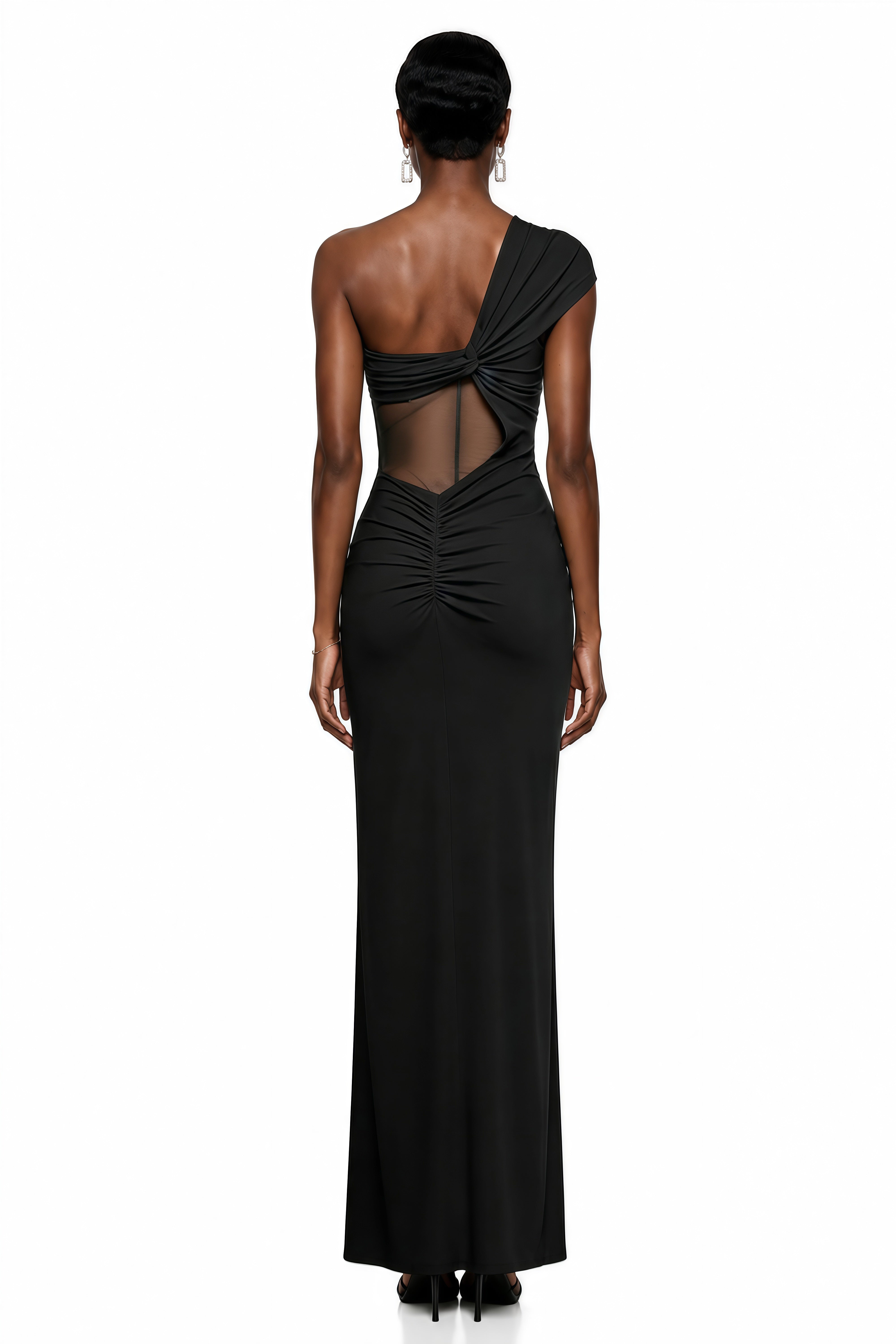 Black one-shoulder gown with cutouts and an embroidered sheer lace panel