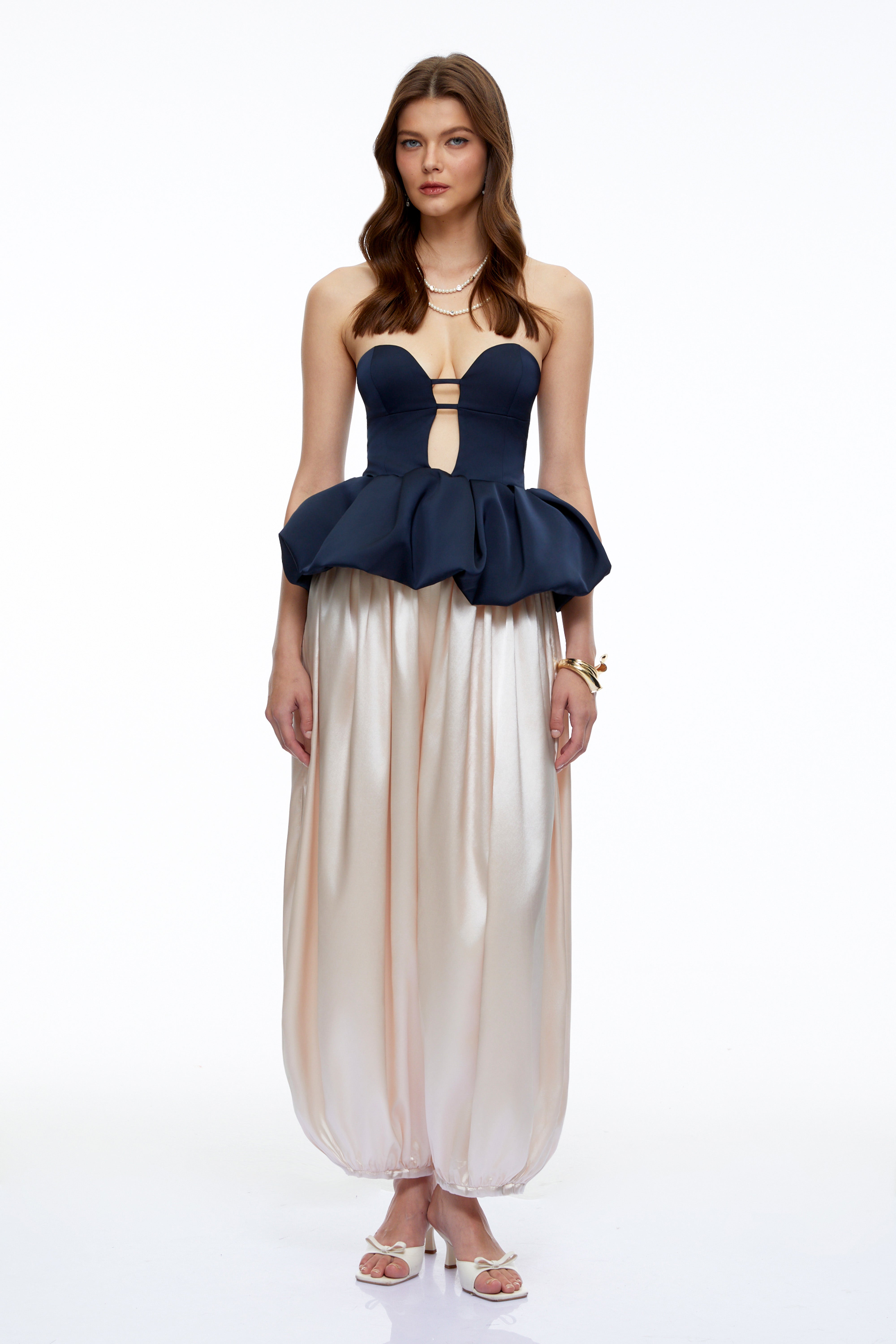 Navy strapless peplum bustier top and beige balloon trousers set