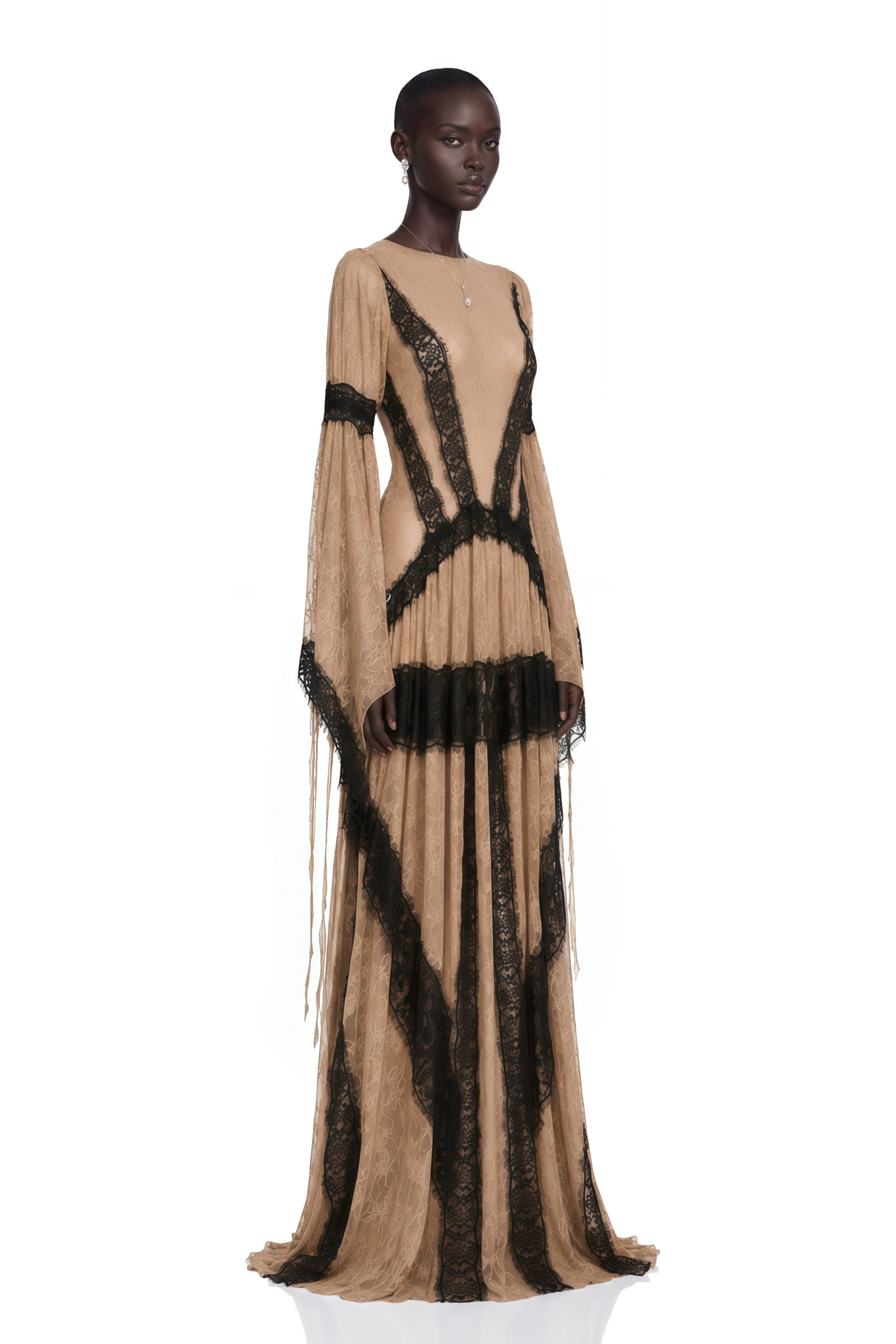 Beige lace maxi dress featuring long bell sleeves and contrast black lace trim
