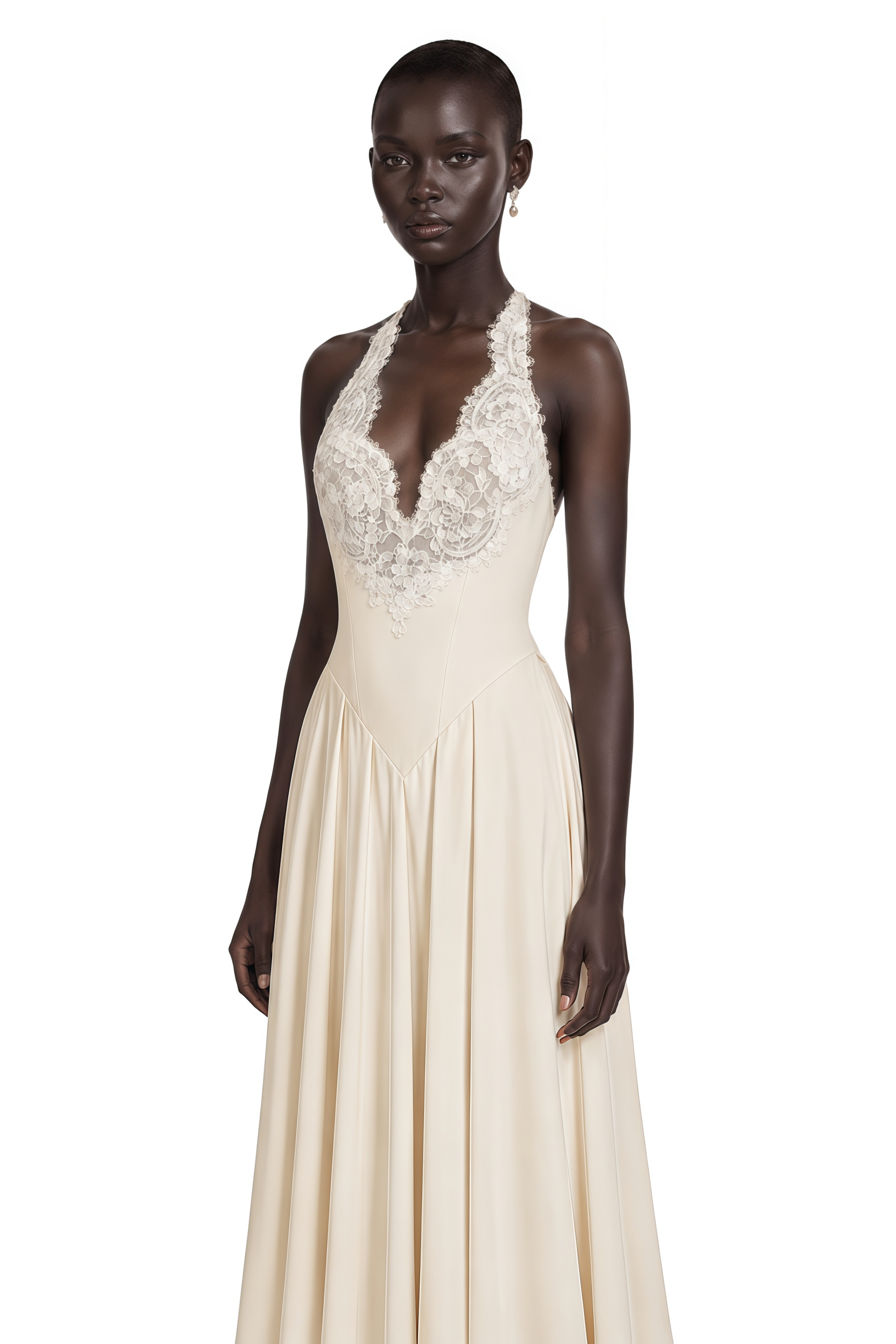 Cream halter maxi dress featuring an intricate lace bodice and a flowing pleated skirt