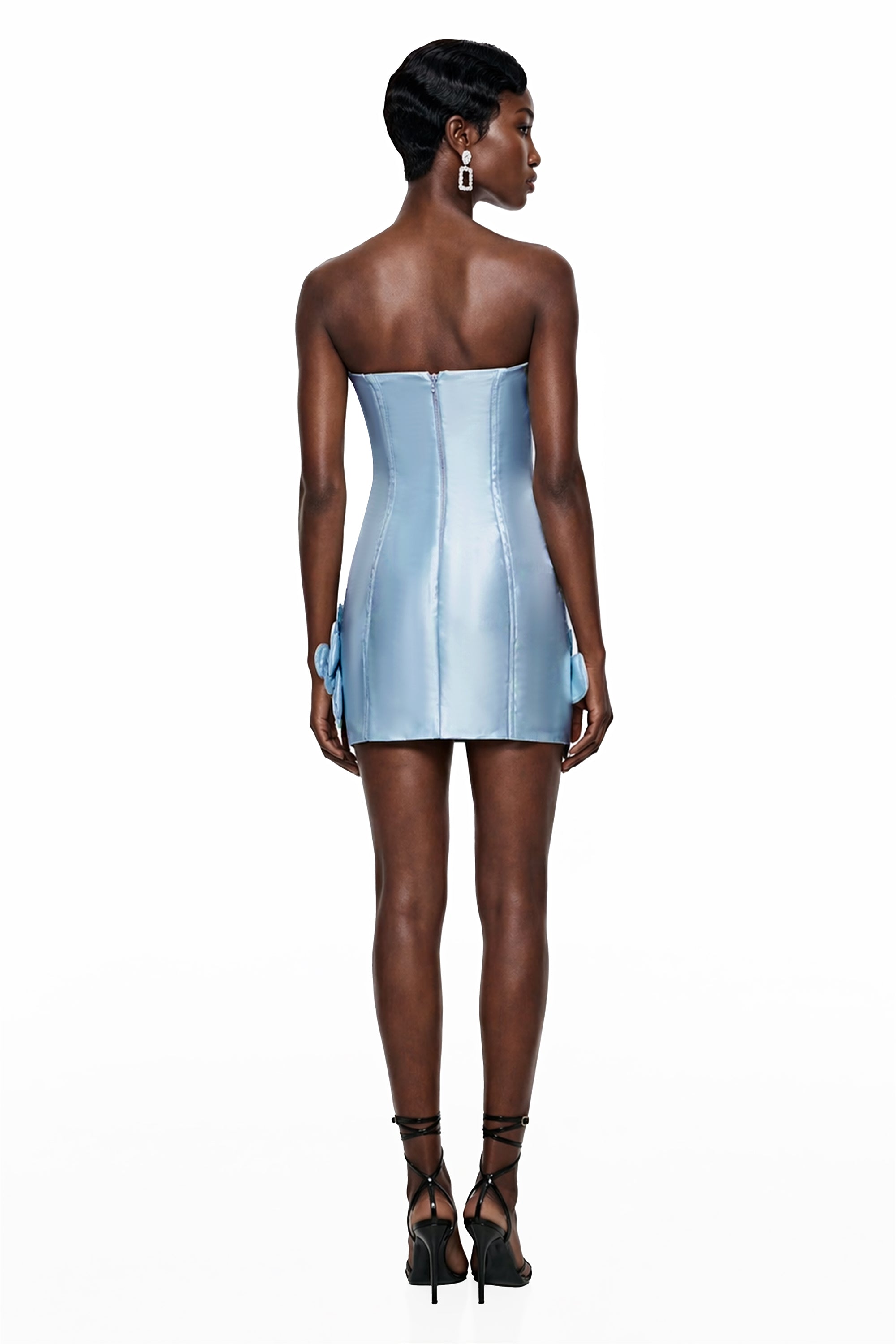 Light blue strapless mini dress featuring a structured corset bodice, detailed with embellished 3D floral appliqués