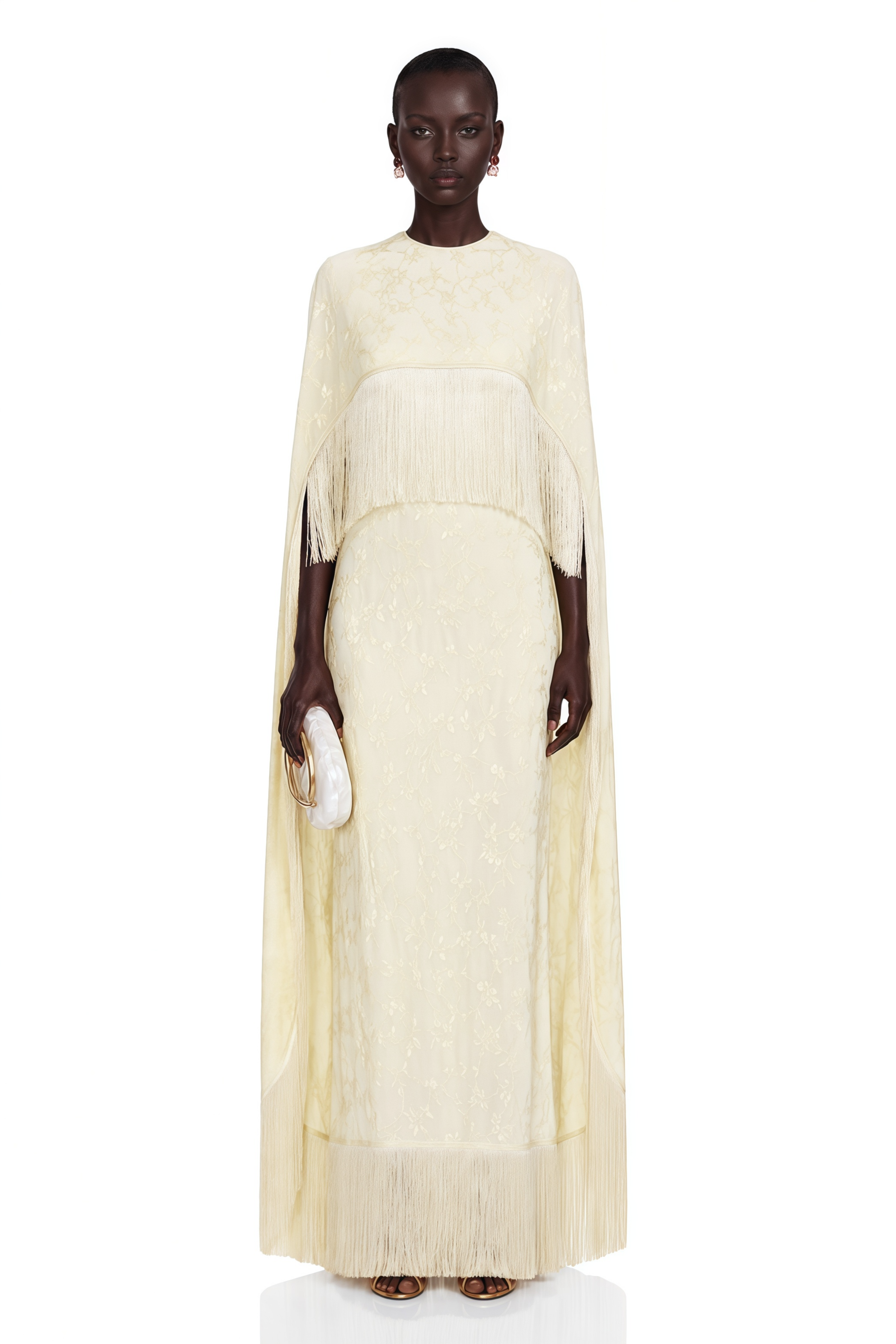 Yellow cape gown with fringe trim