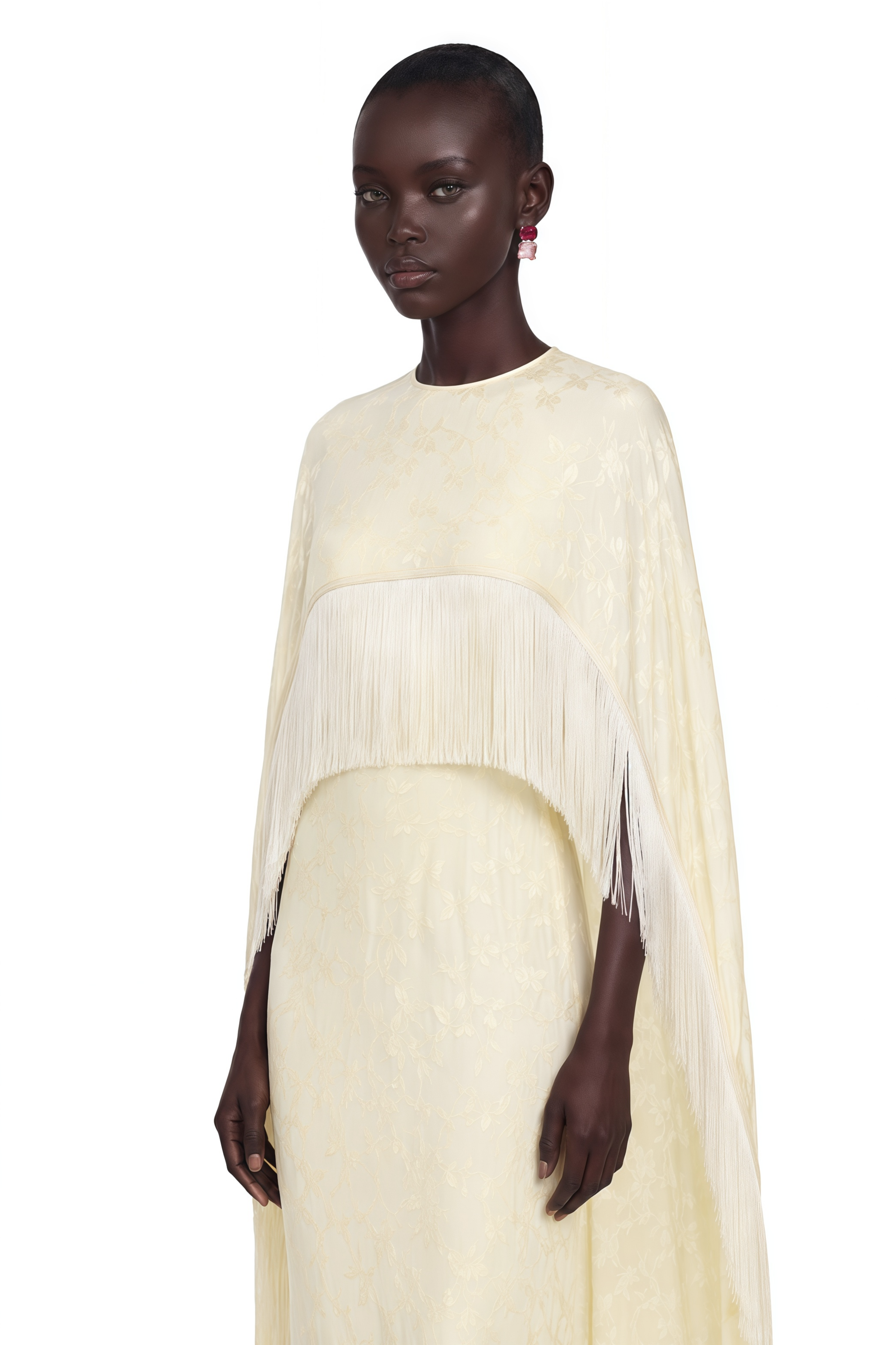 Yellow cape gown with fringe trim