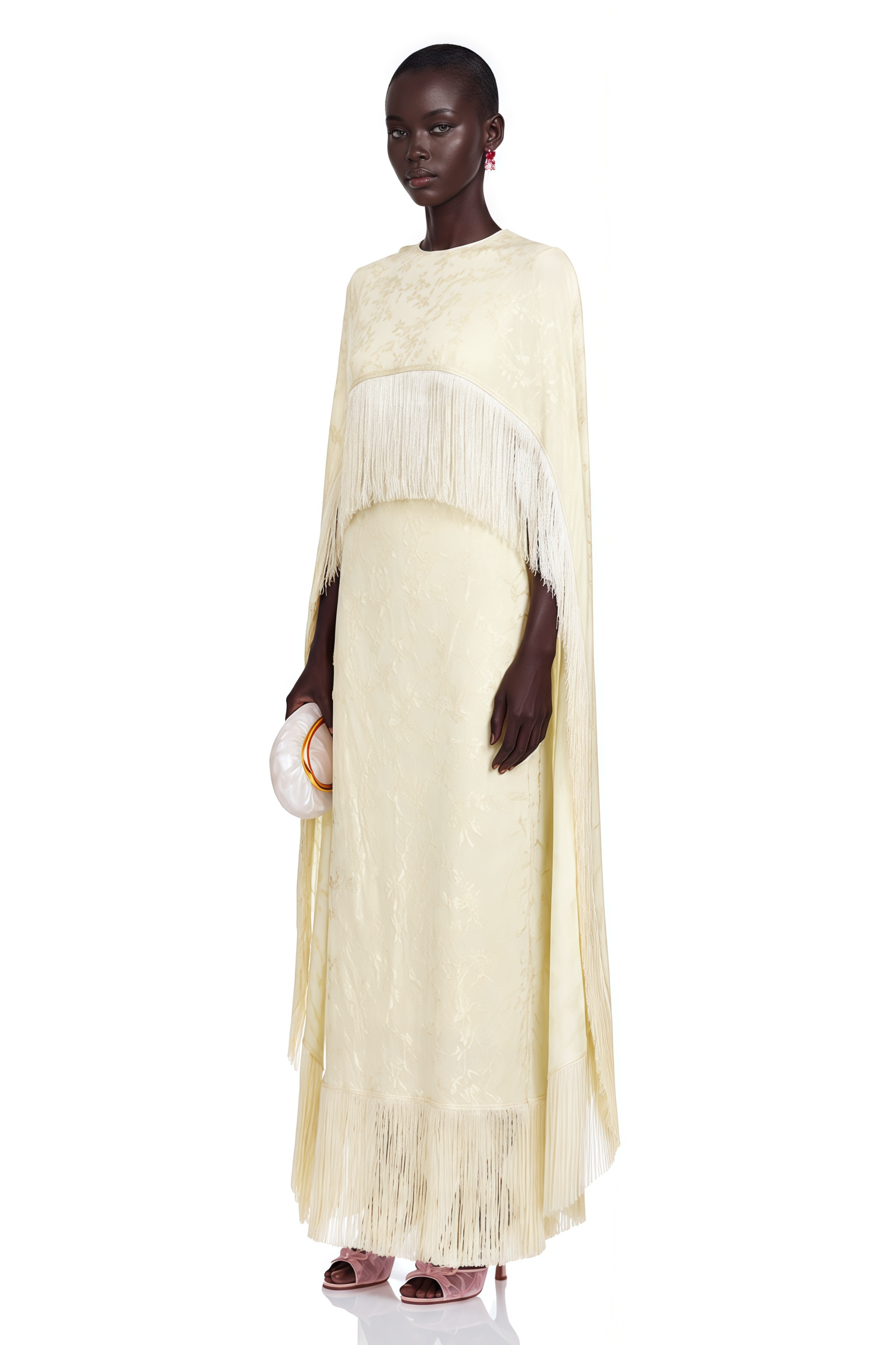 Yellow cape gown with fringe trim