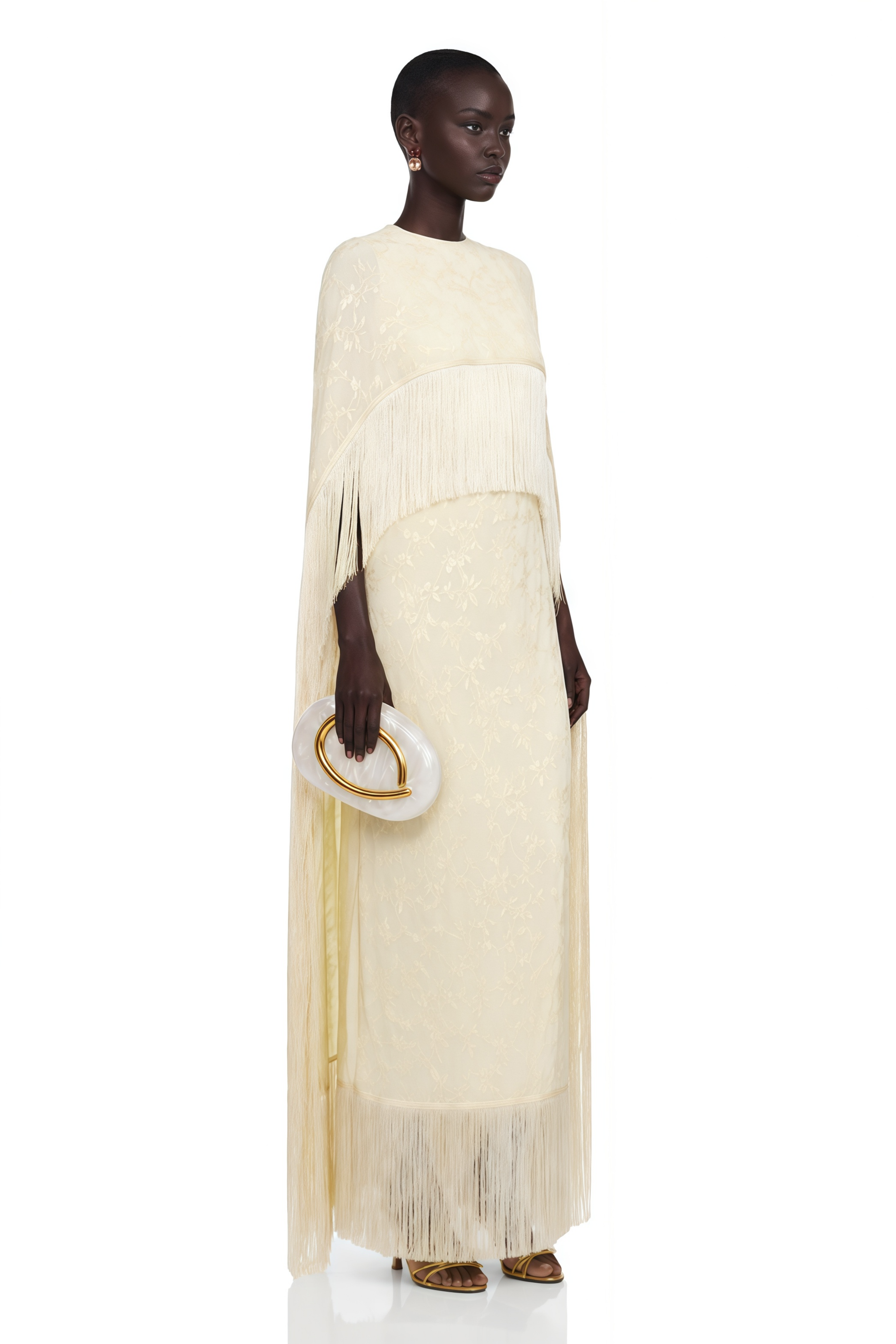 Yellow cape gown with fringe trim