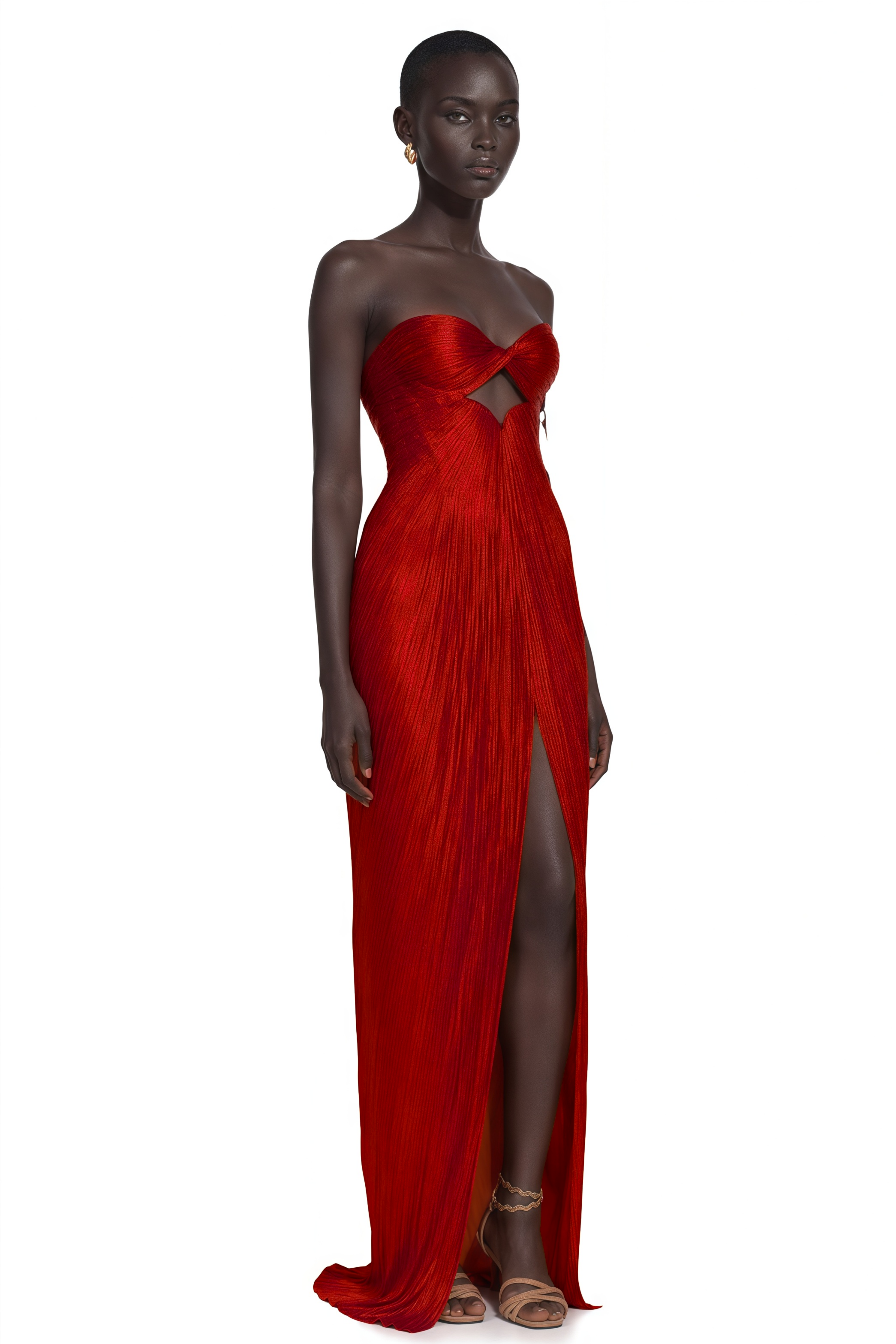Red strapless pleated gown with front cutout and thigh-high slit