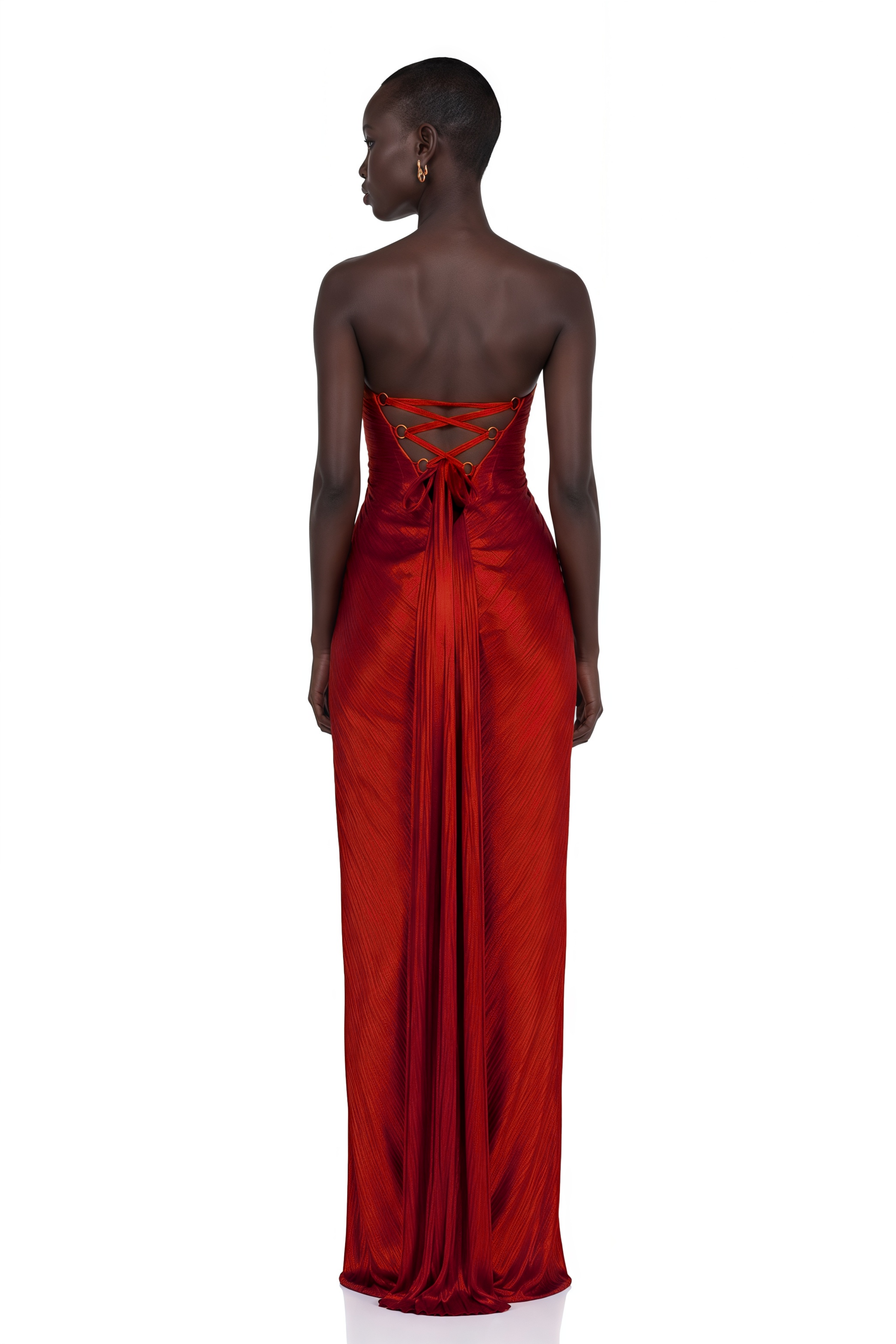 Red strapless pleated gown with front cutout and thigh-high slit