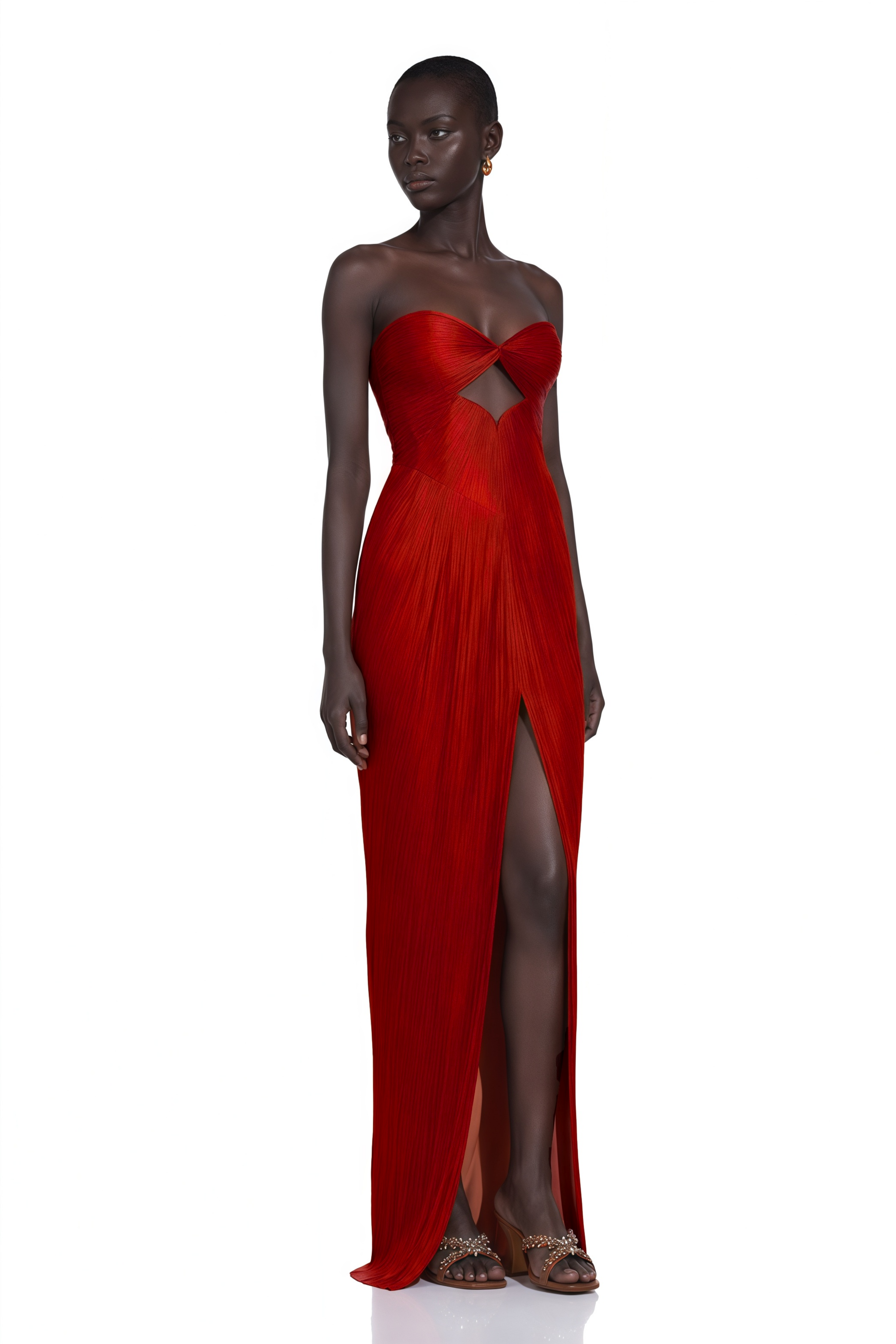Red strapless pleated gown with front cutout and thigh-high slit