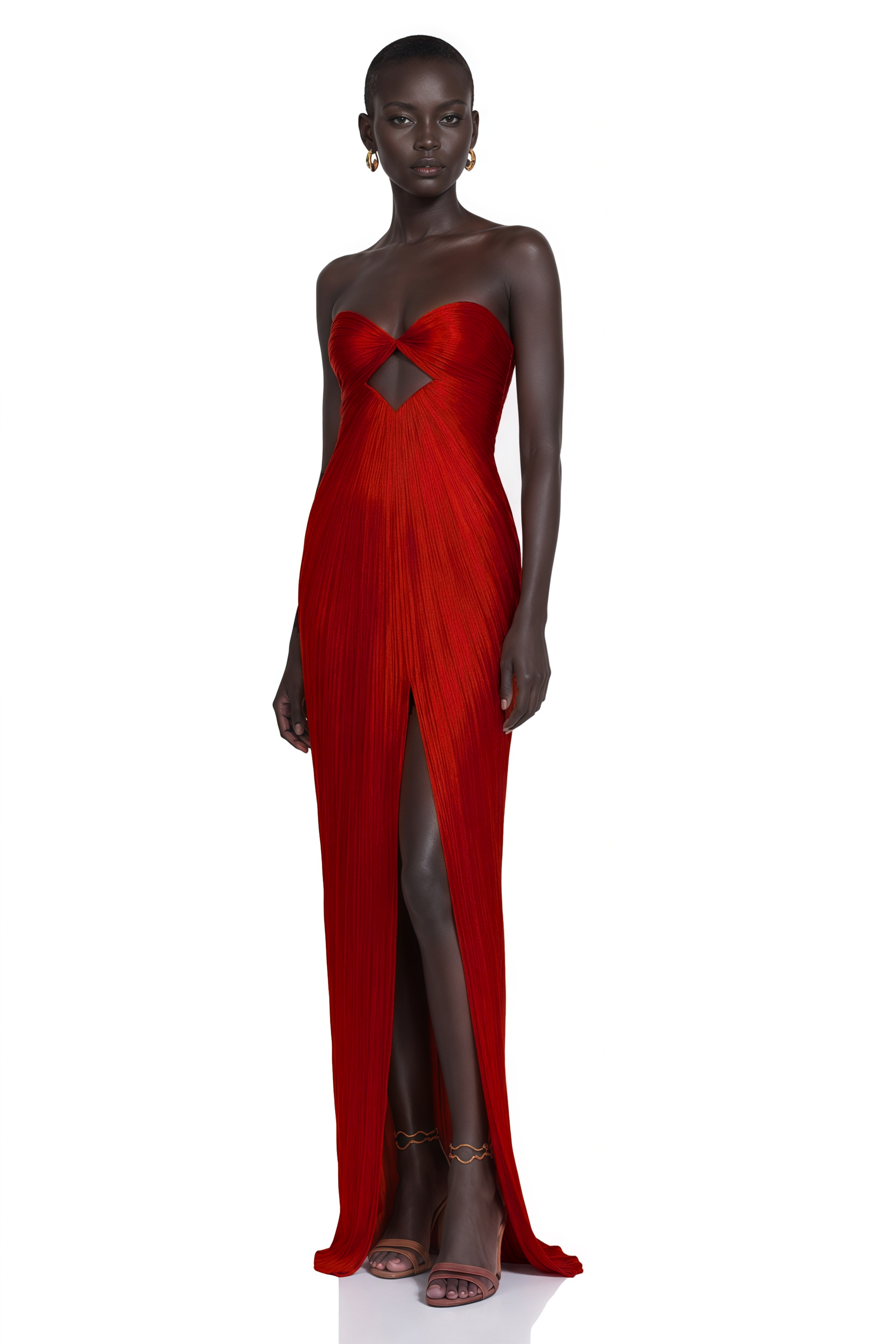 Red strapless pleated gown with front cutout and thigh-high slit