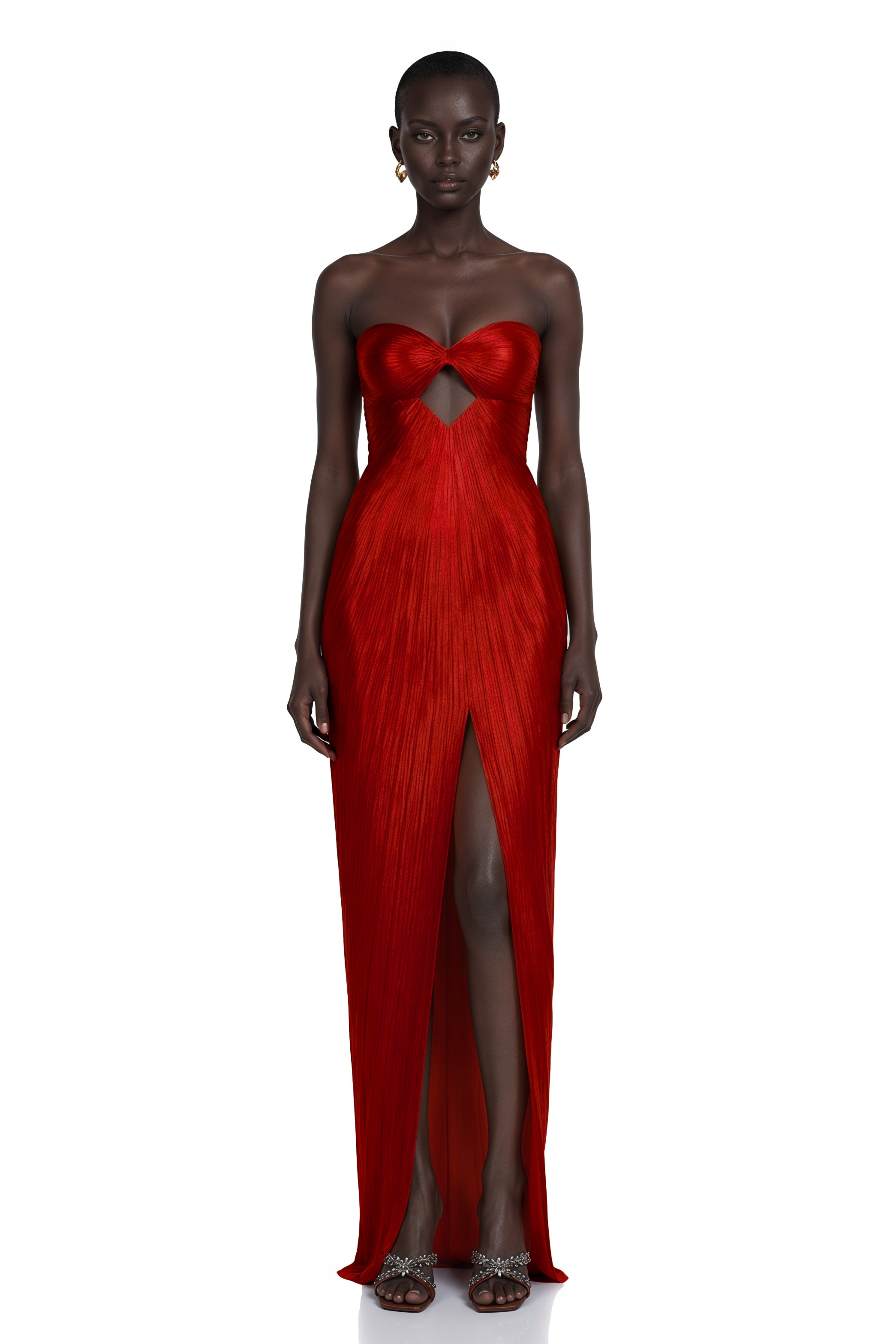 Red strapless pleated gown with front cutout and thigh-high slit