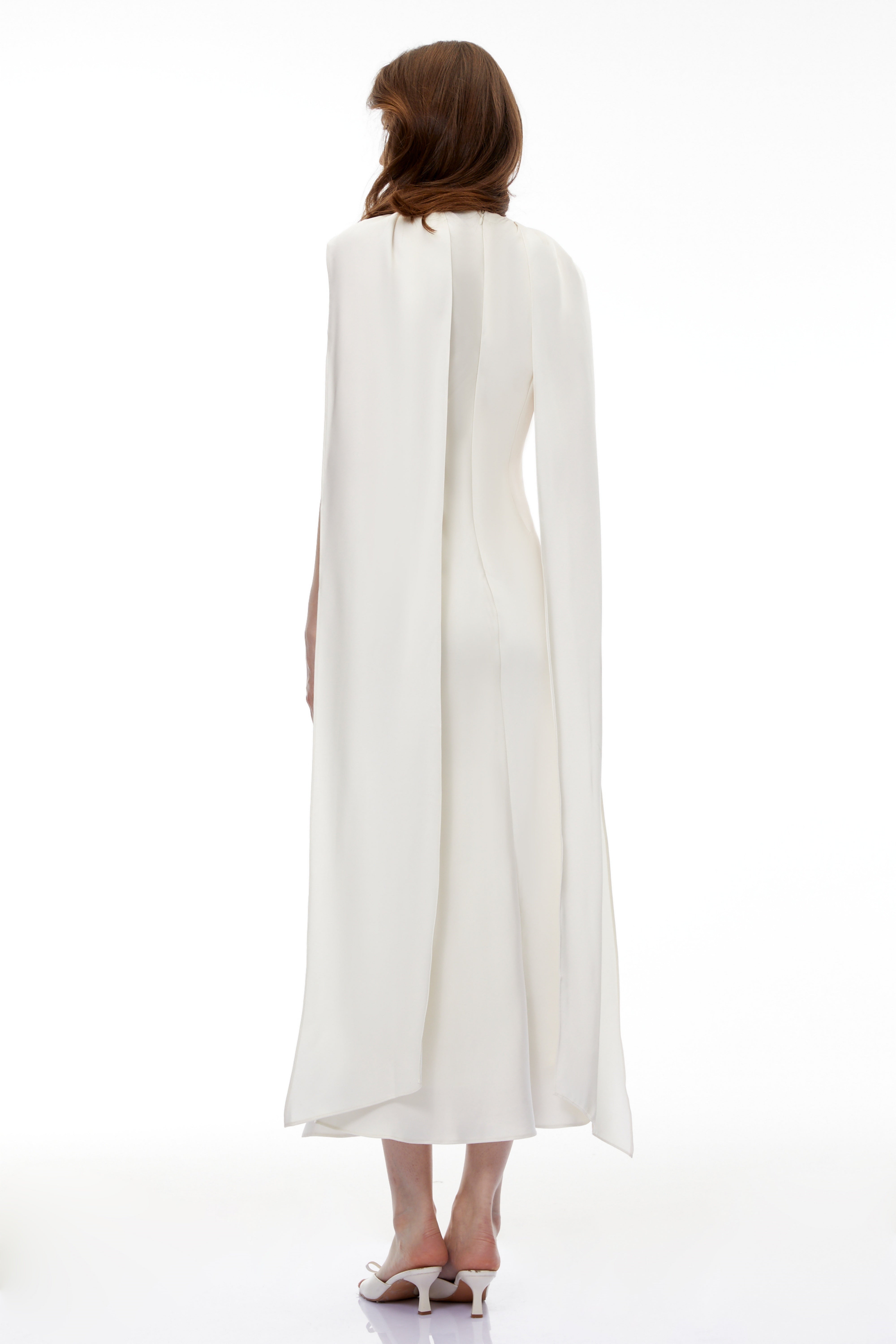 Elegant ivory satin sleeveless gown with a draped scarf neckline