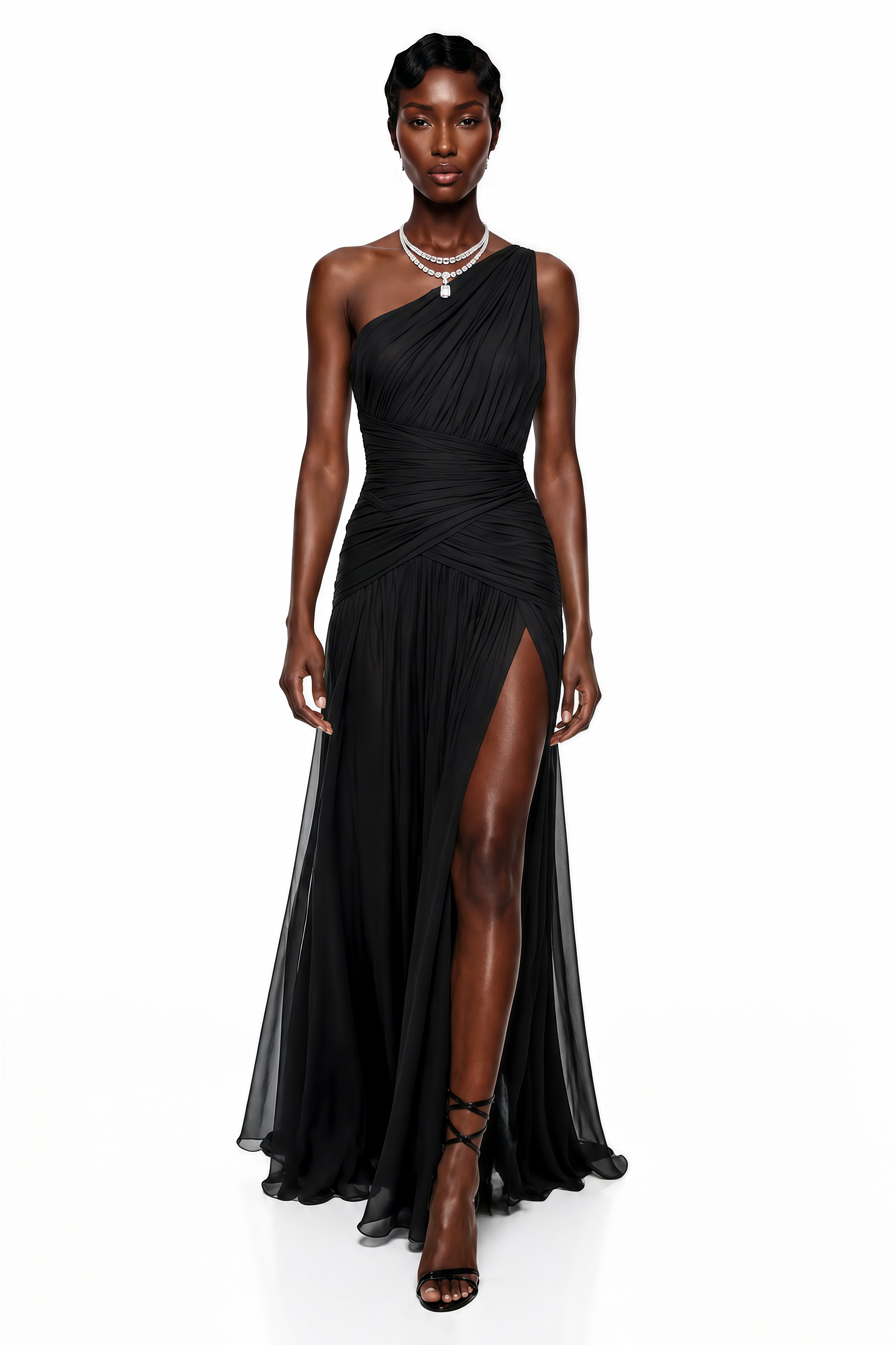 Black pleated one-shoulder maxi dress featuring a crisscross ruched bodice and a high thigh slit