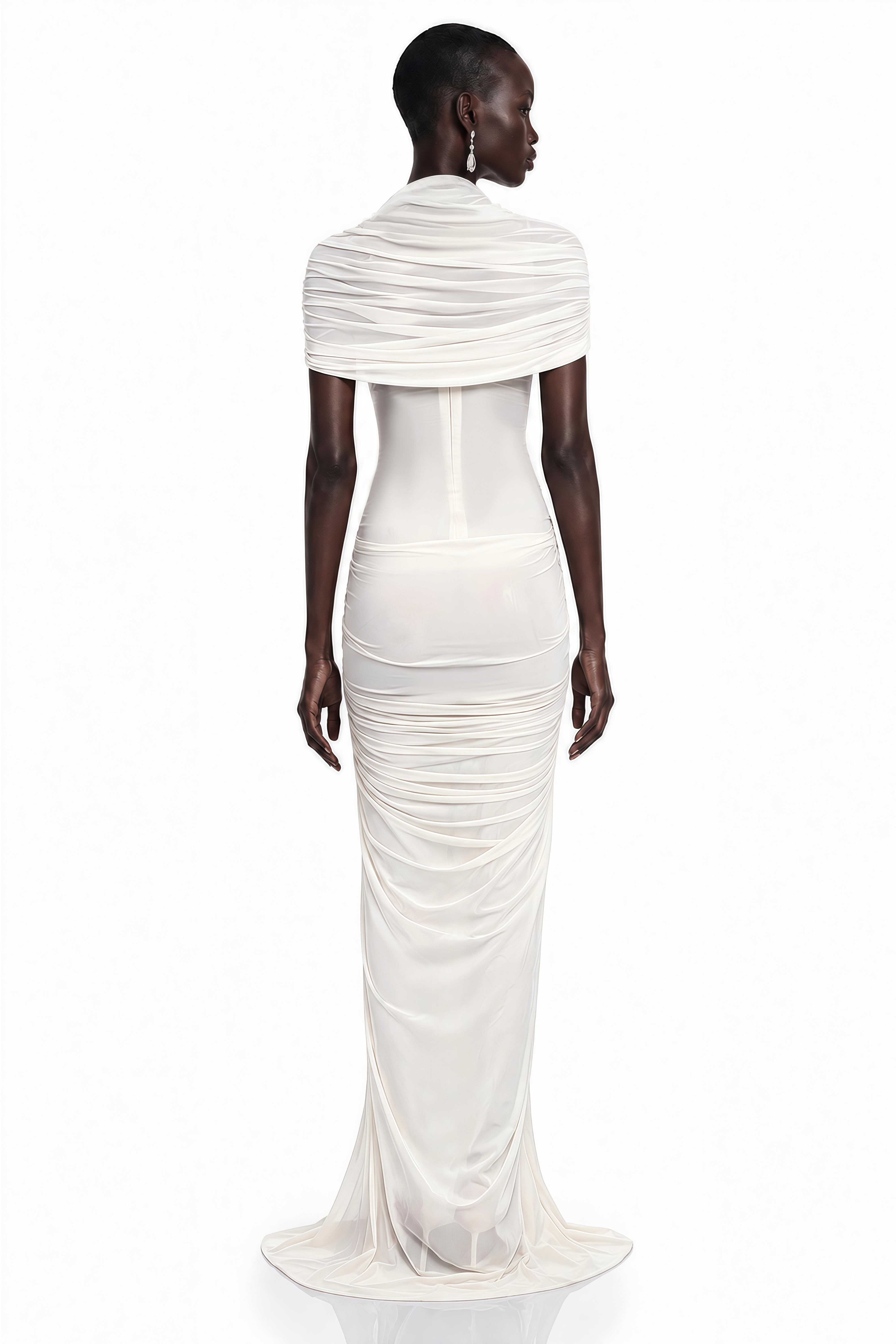 White maxi dress with a crossed off-the-shoulder neckline and centered front ruching