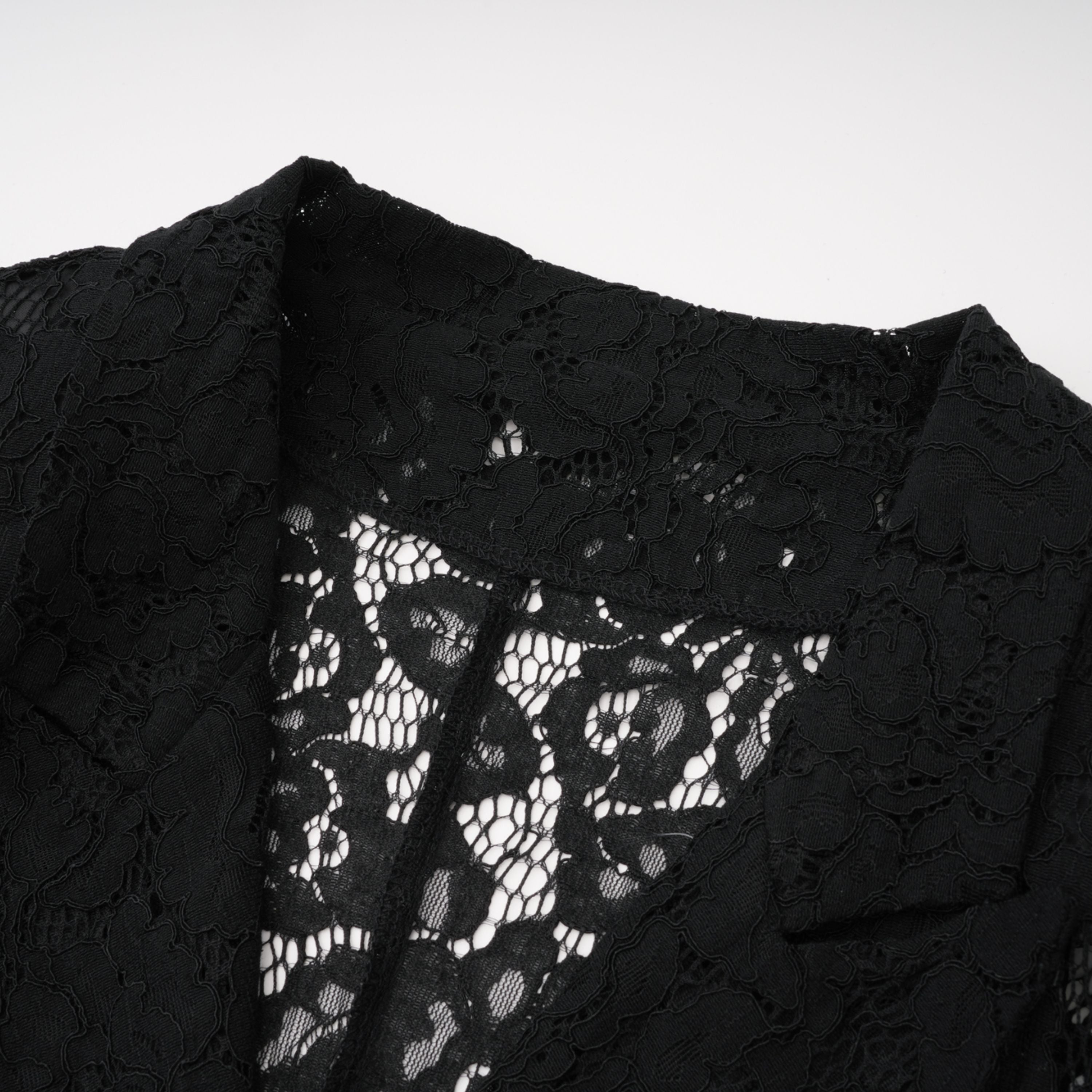 Black sheer floral lace pantsuit with structured shoulders