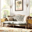French Provincial Tufted Velvet Seating with Hand-Carved Wood Frame and Distressed Finish