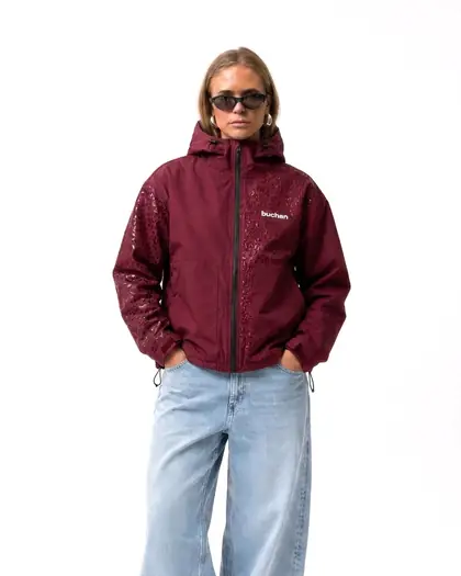 Model wearing the pink reactive jacket outdoors