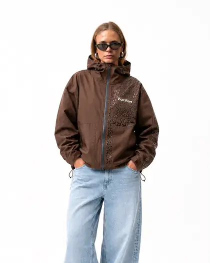 Model wearing the green reactive jacket under water