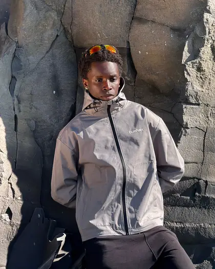 Model wearing the grey reactive jacket