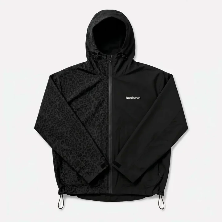 Black water-reactive cheetah rain jacket